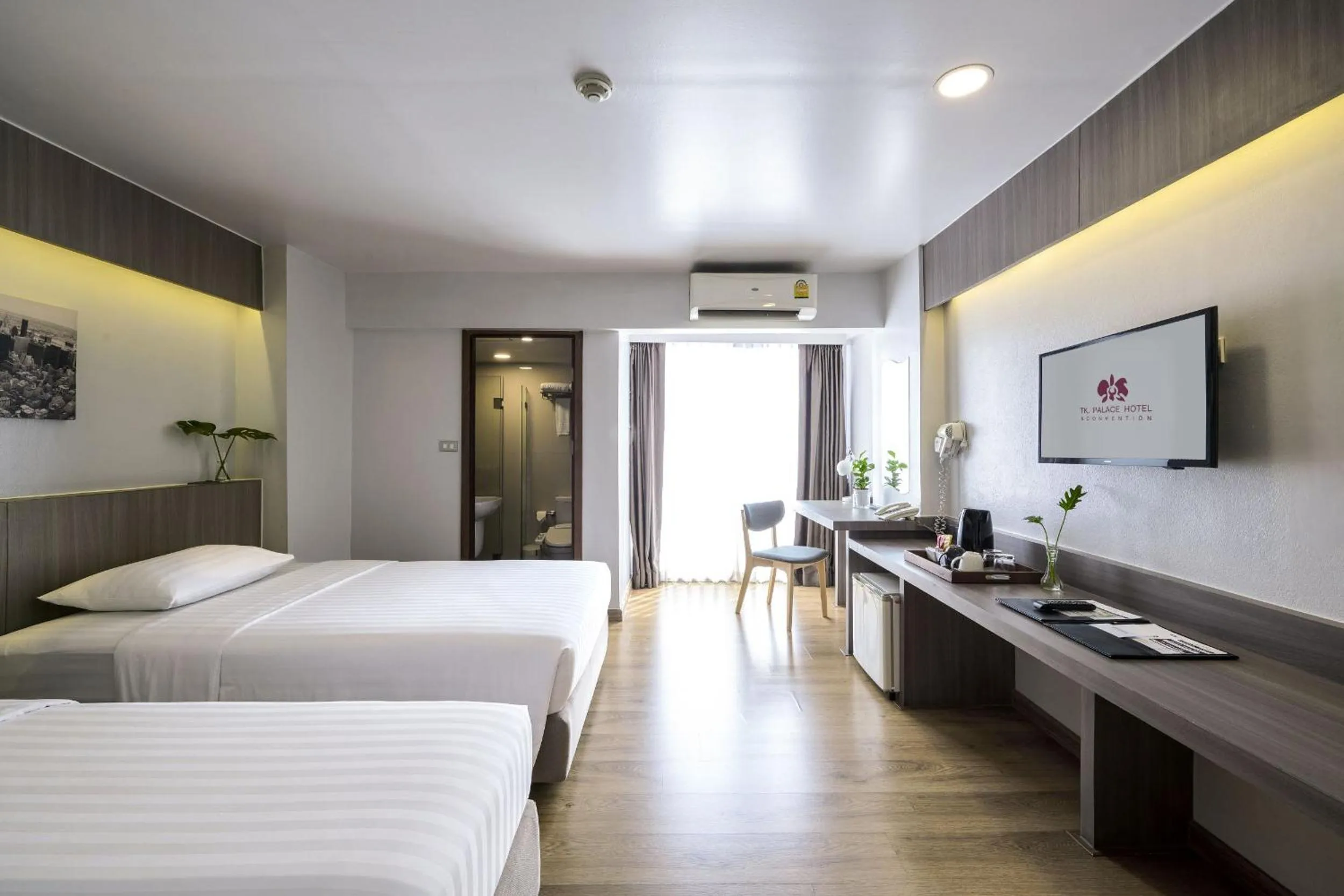 Bed in TK Palace Hotel & Convention Bangkok