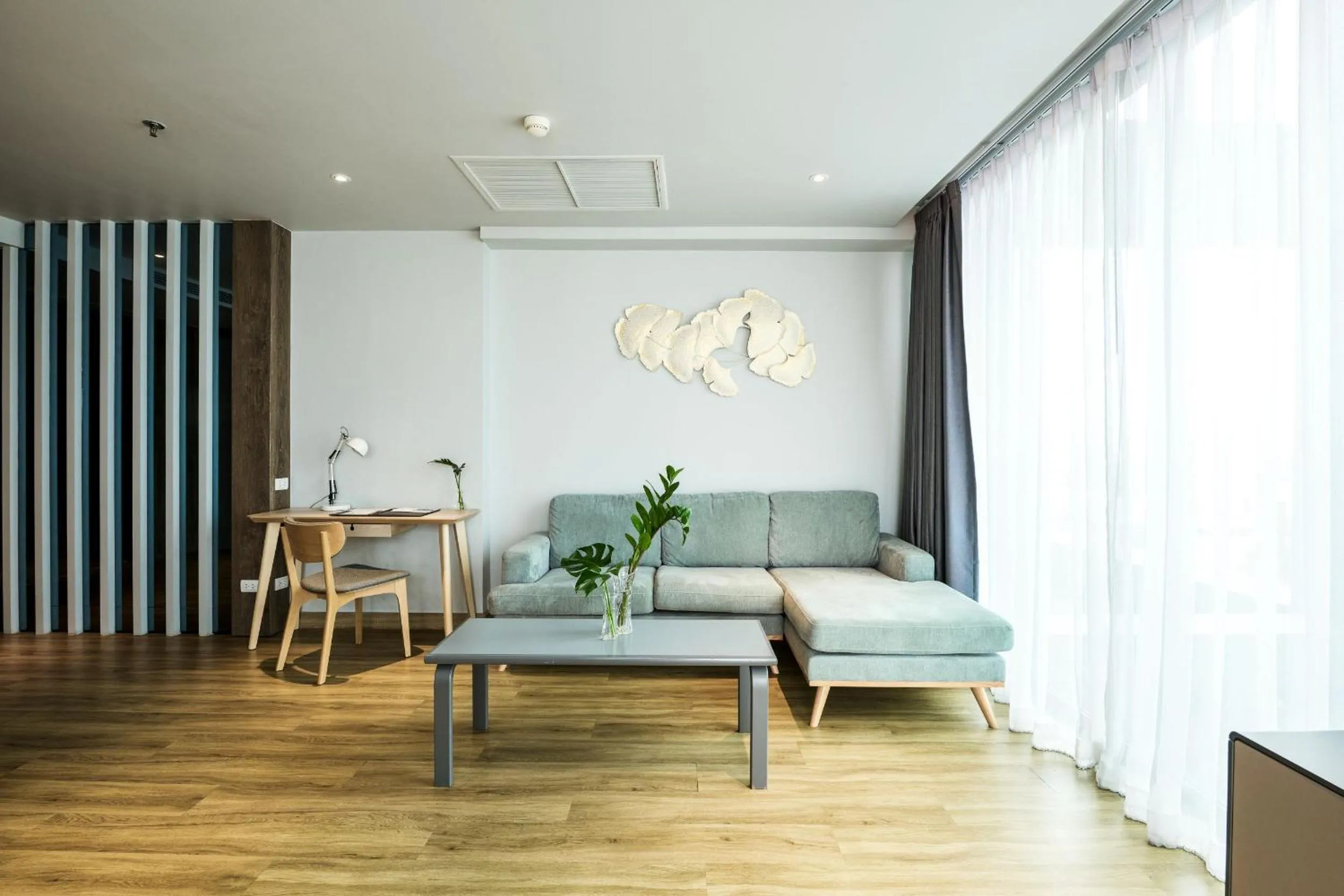 Living room in TK Palace Hotel & Convention Bangkok