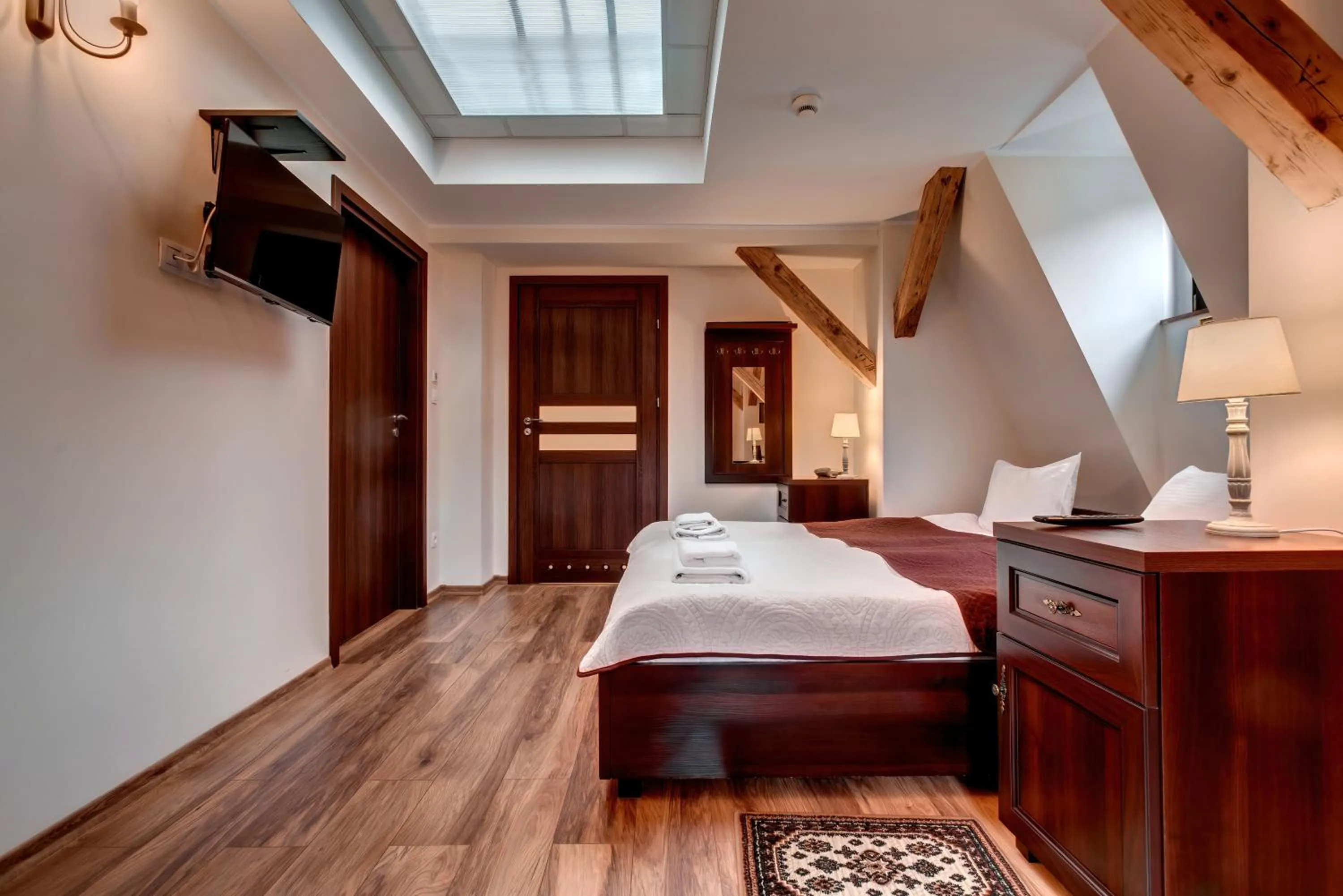 Bed in Hotel Charlotta