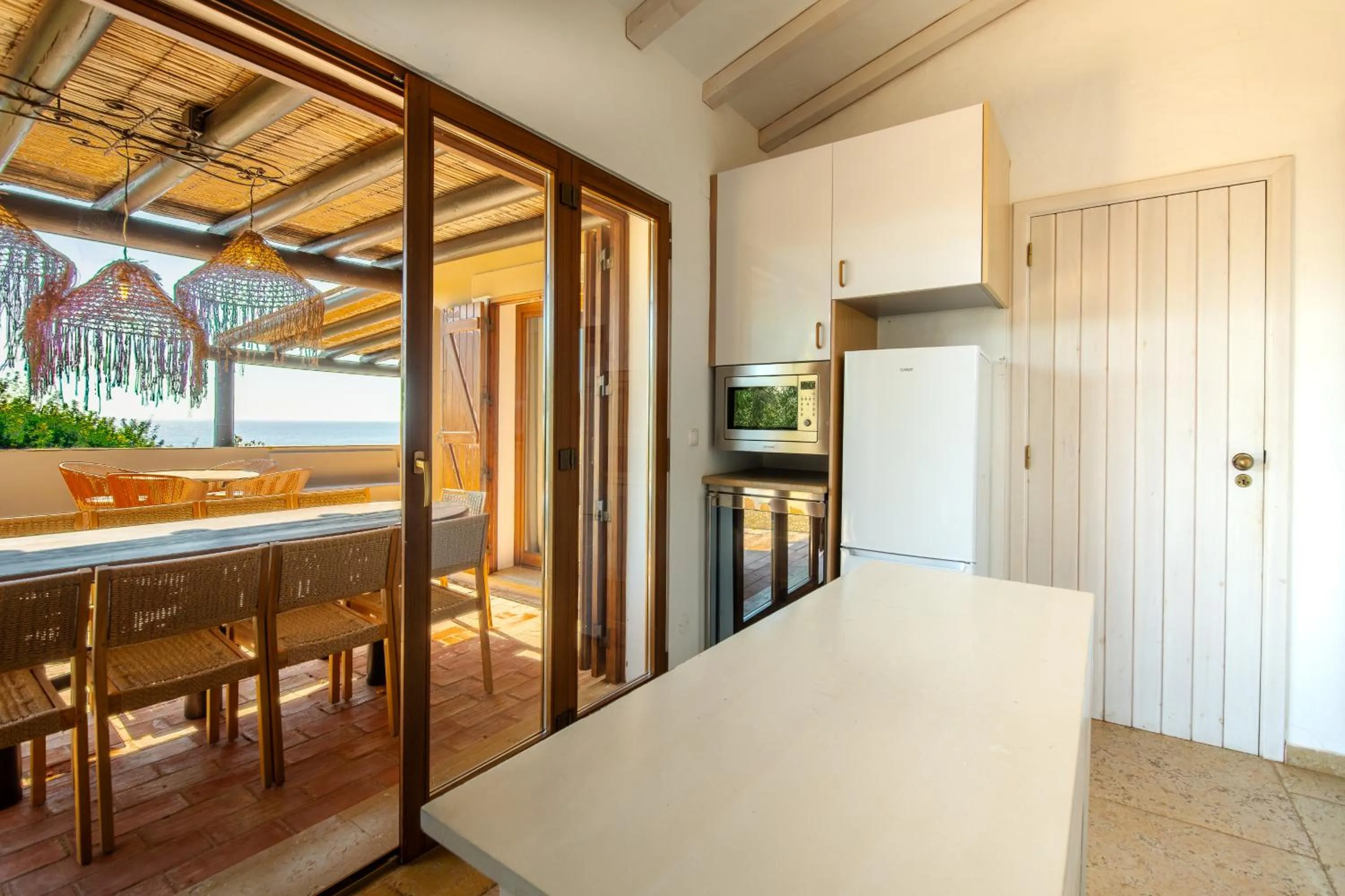 Kitchen or kitchenette in Aldeamento Turistico da Prainha