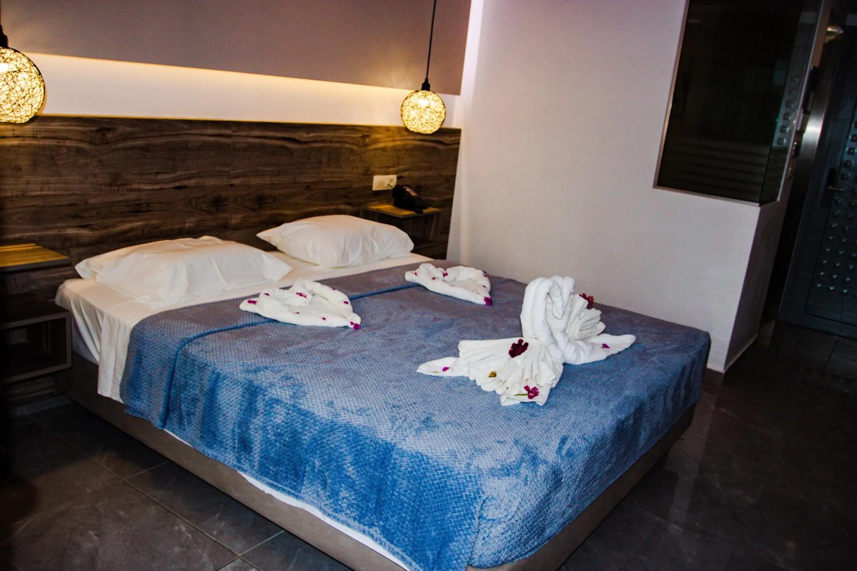 Bed in Sunshine Hotel Tigaki