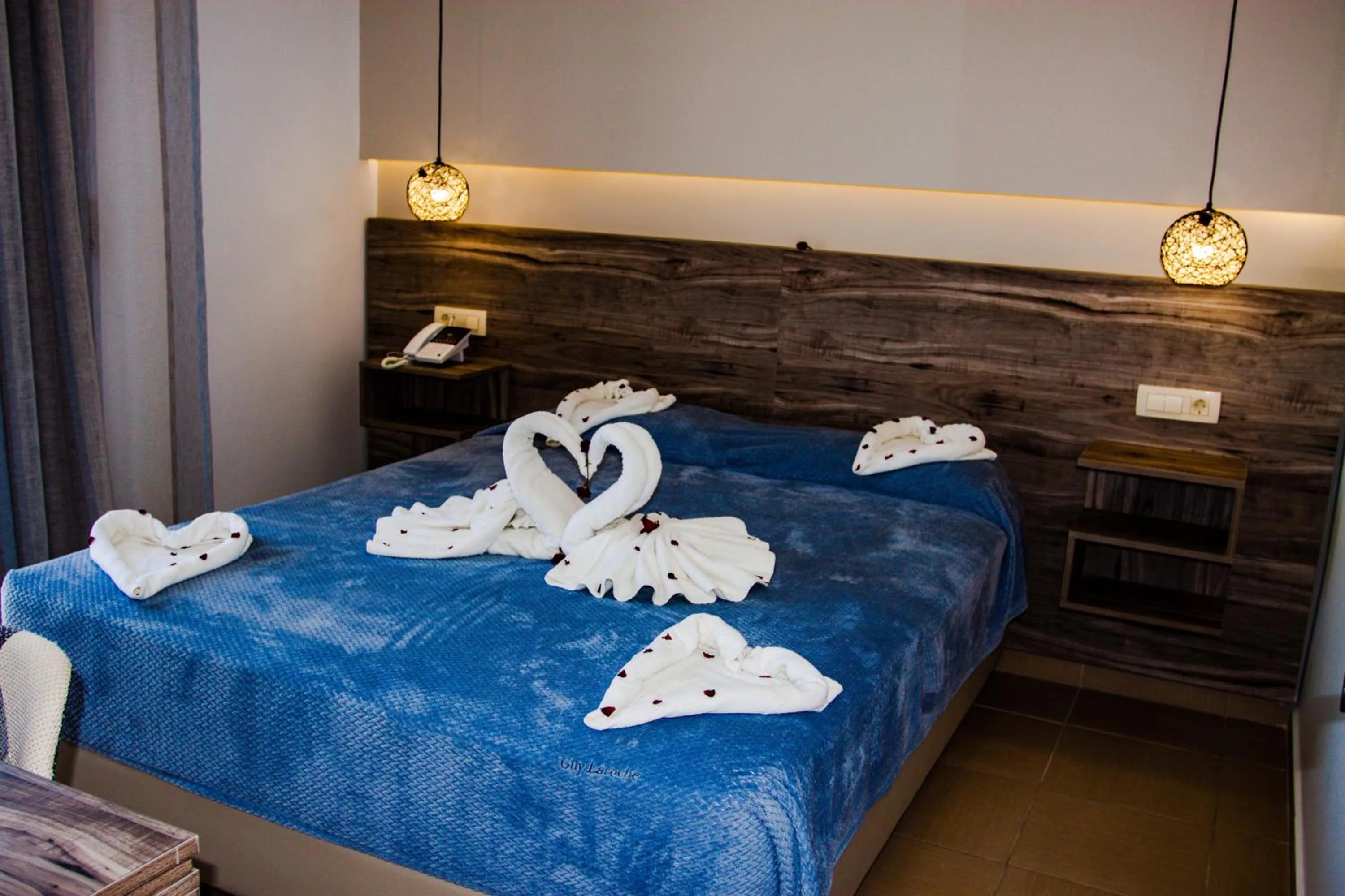 Bed in Sunshine Hotel Tigaki