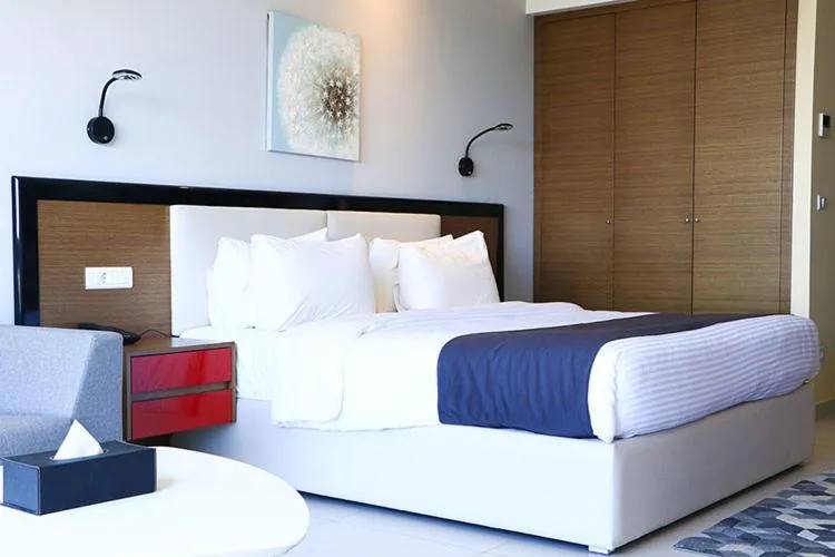 Bed in The Ray Hotel and Studios