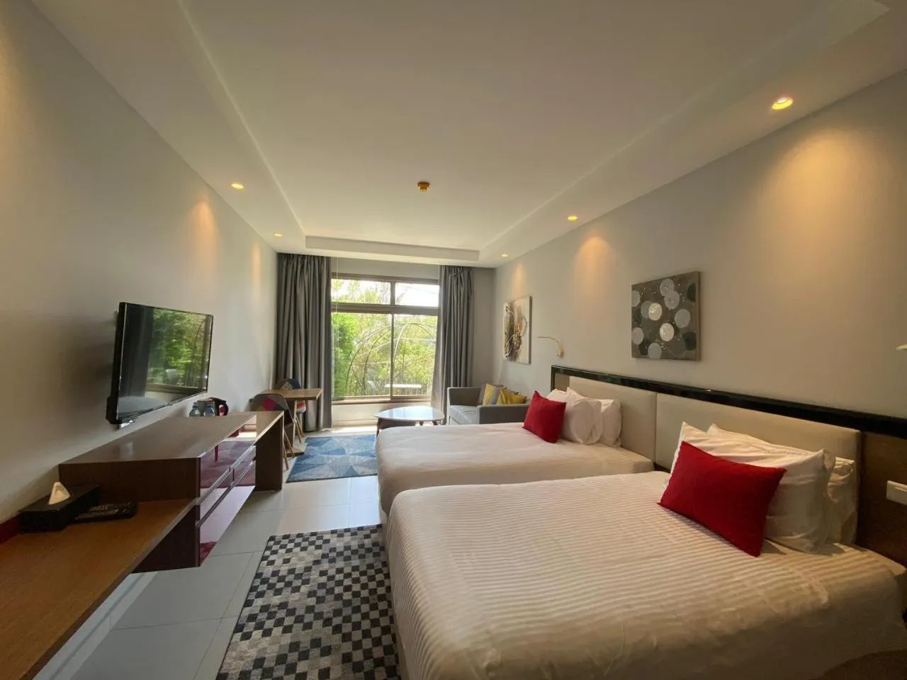 Bed in The Ray Hotel and Studios