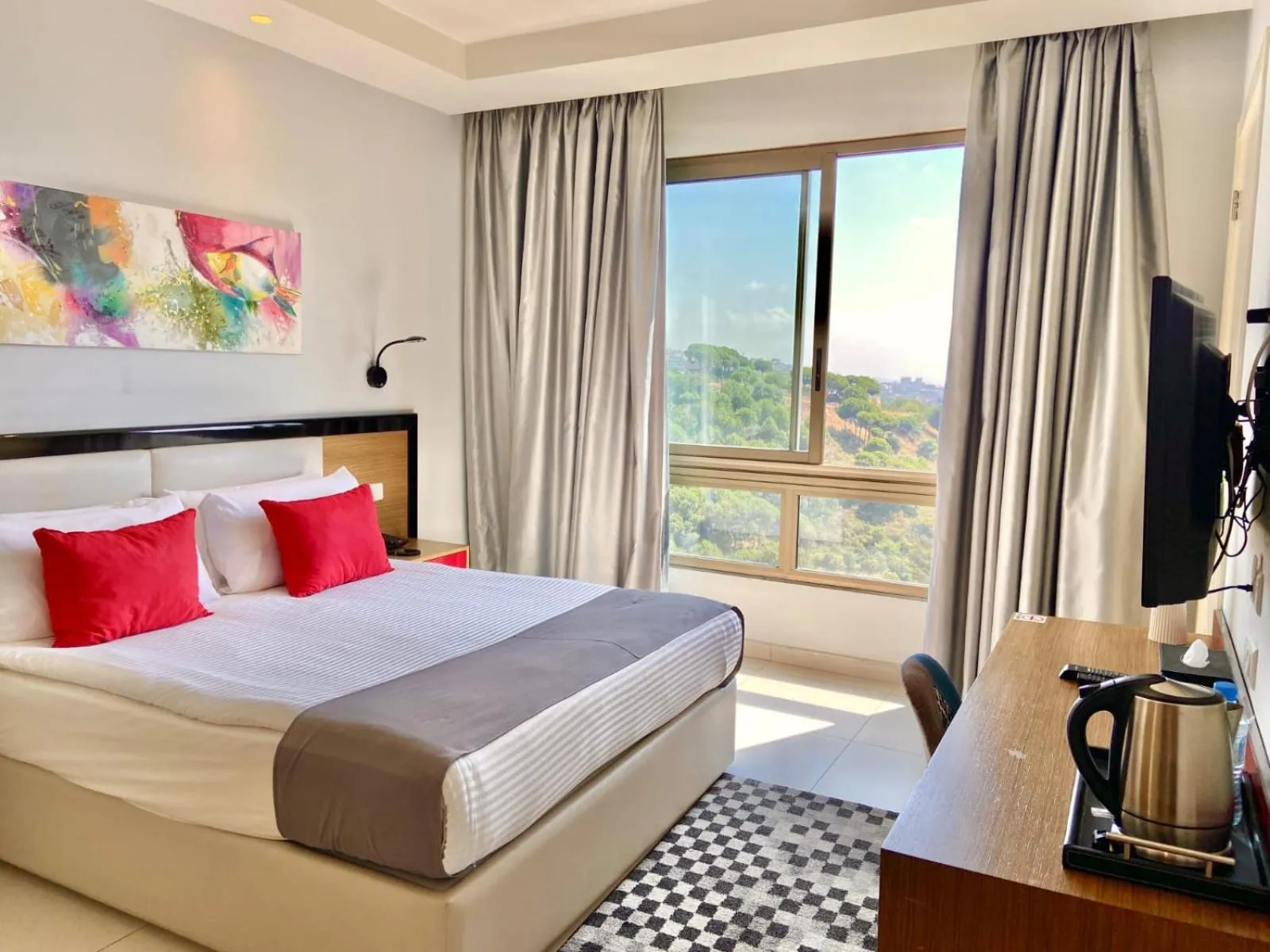 Bed in The Ray Hotel and Studios