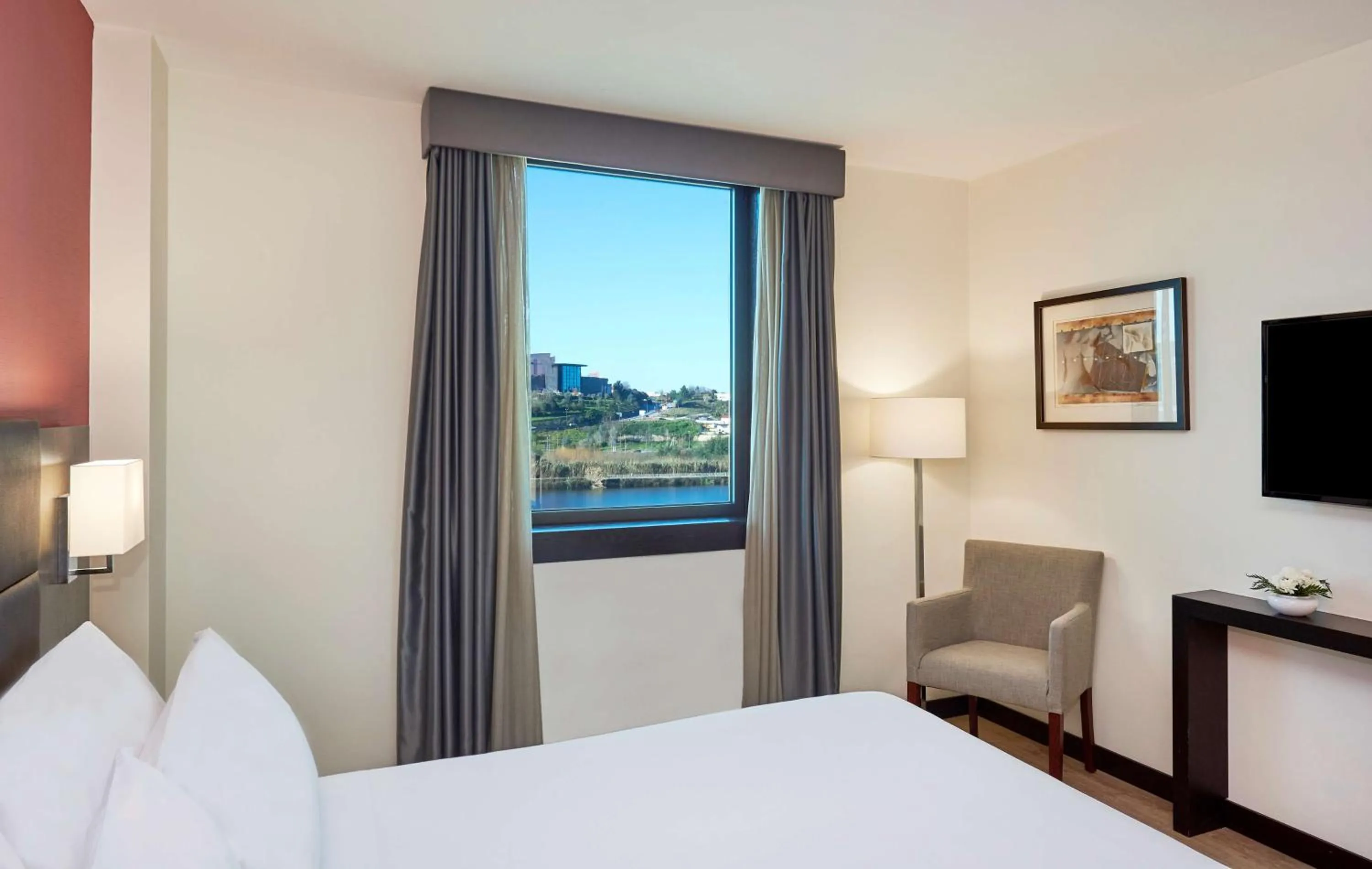 View (from property/room), Bed in NH Coimbra Dona Ines