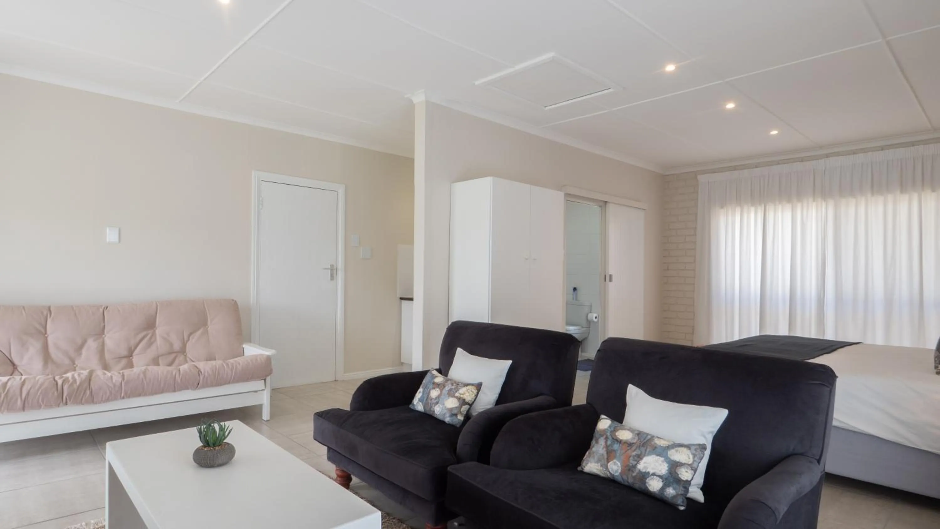 Living room in Interlaken Guest House