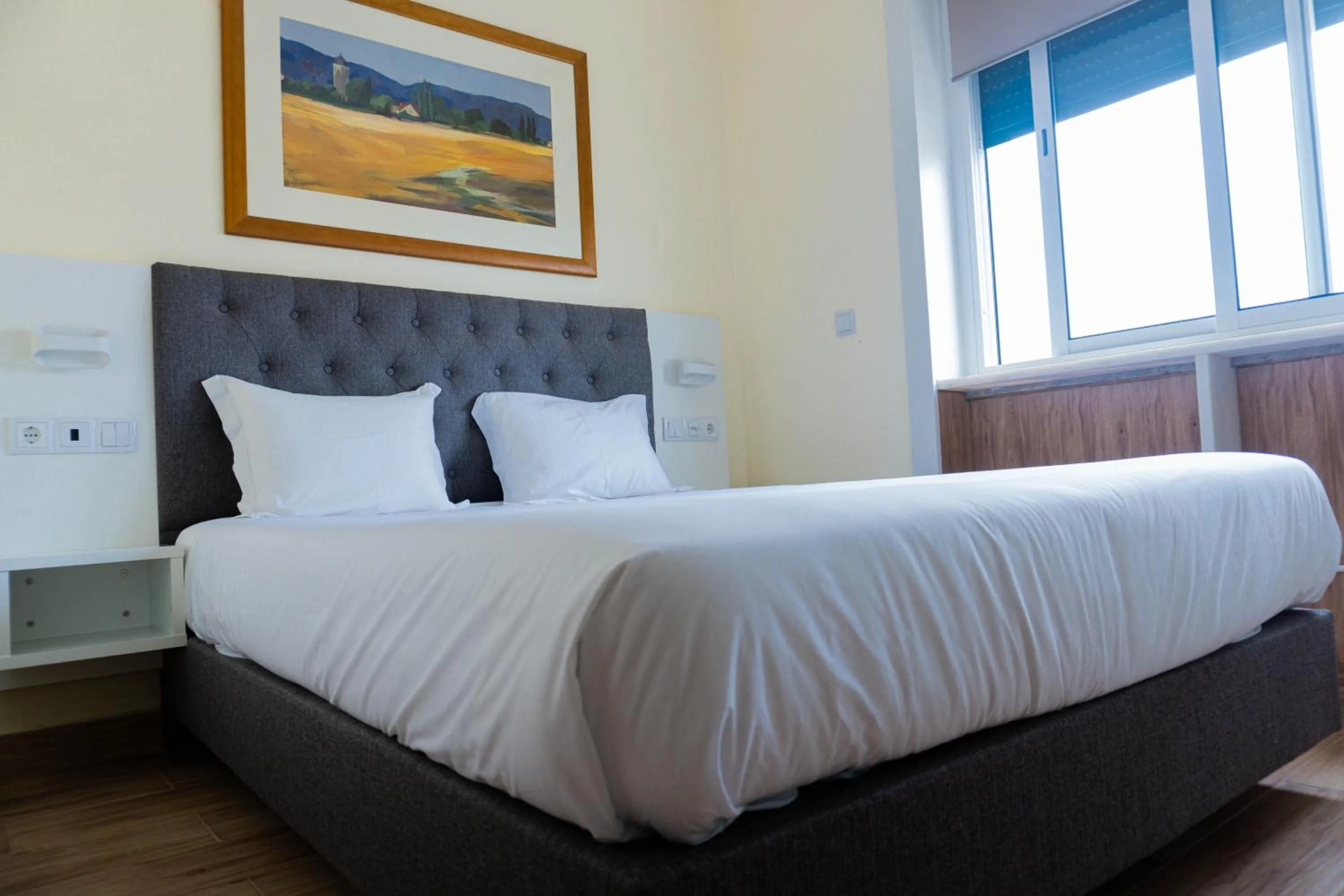 View (from property/room), Bed in Residencial do Areeiro