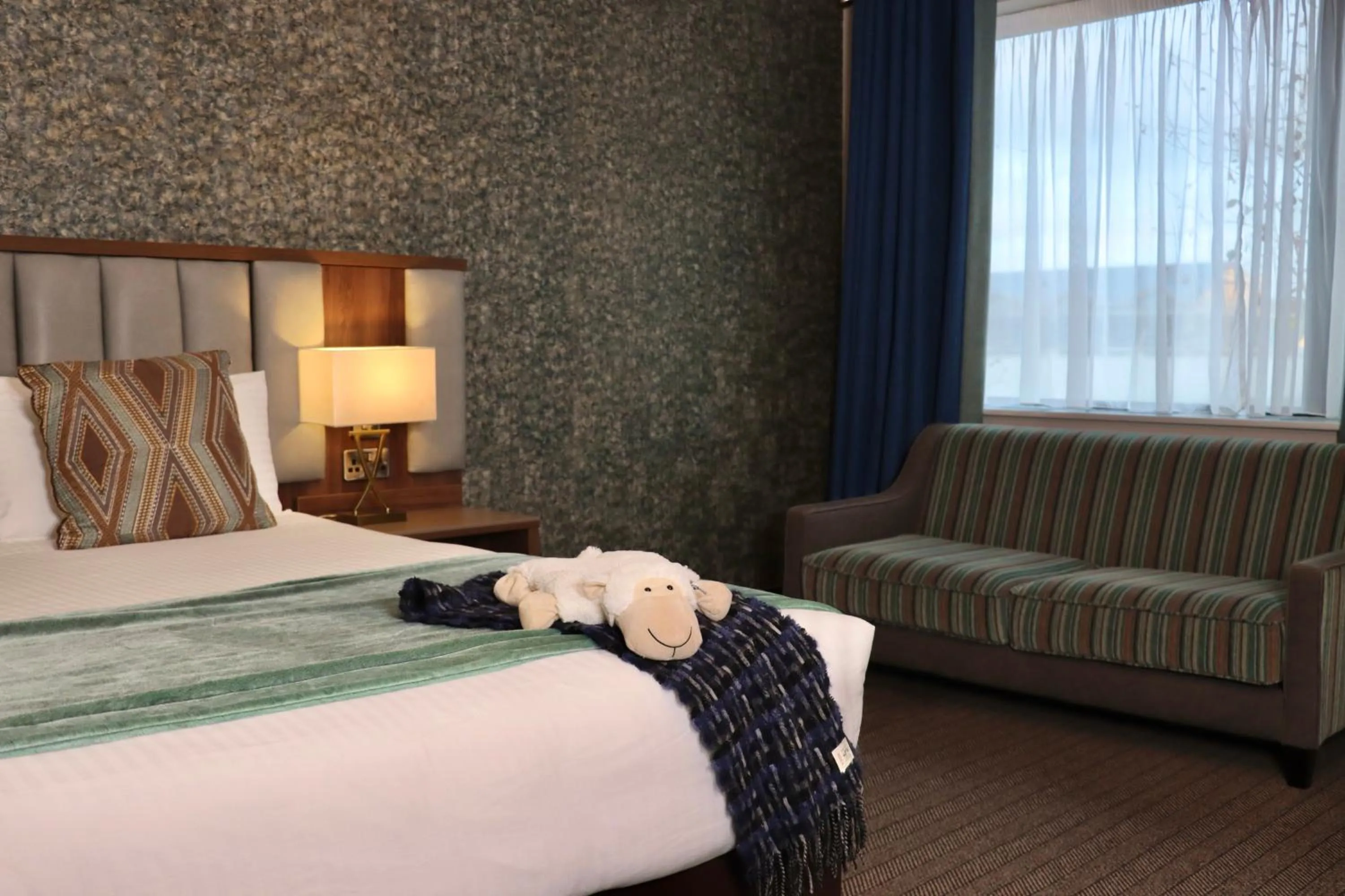 Bed in Amber Springs Hotel