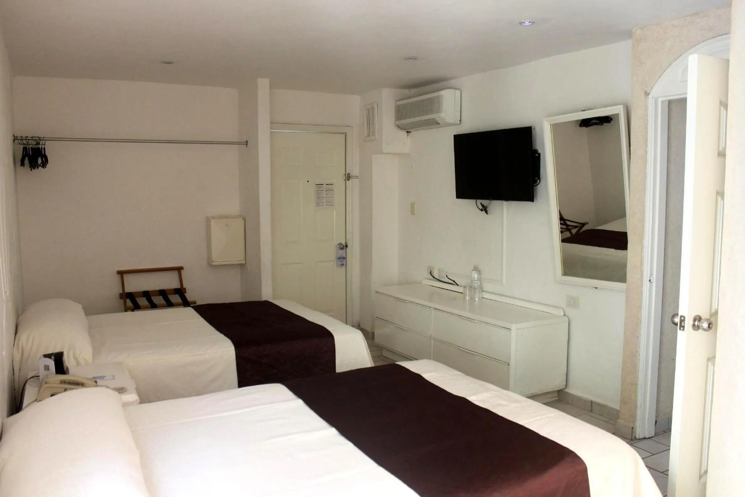 Bed in Hotel Plaza Caribe