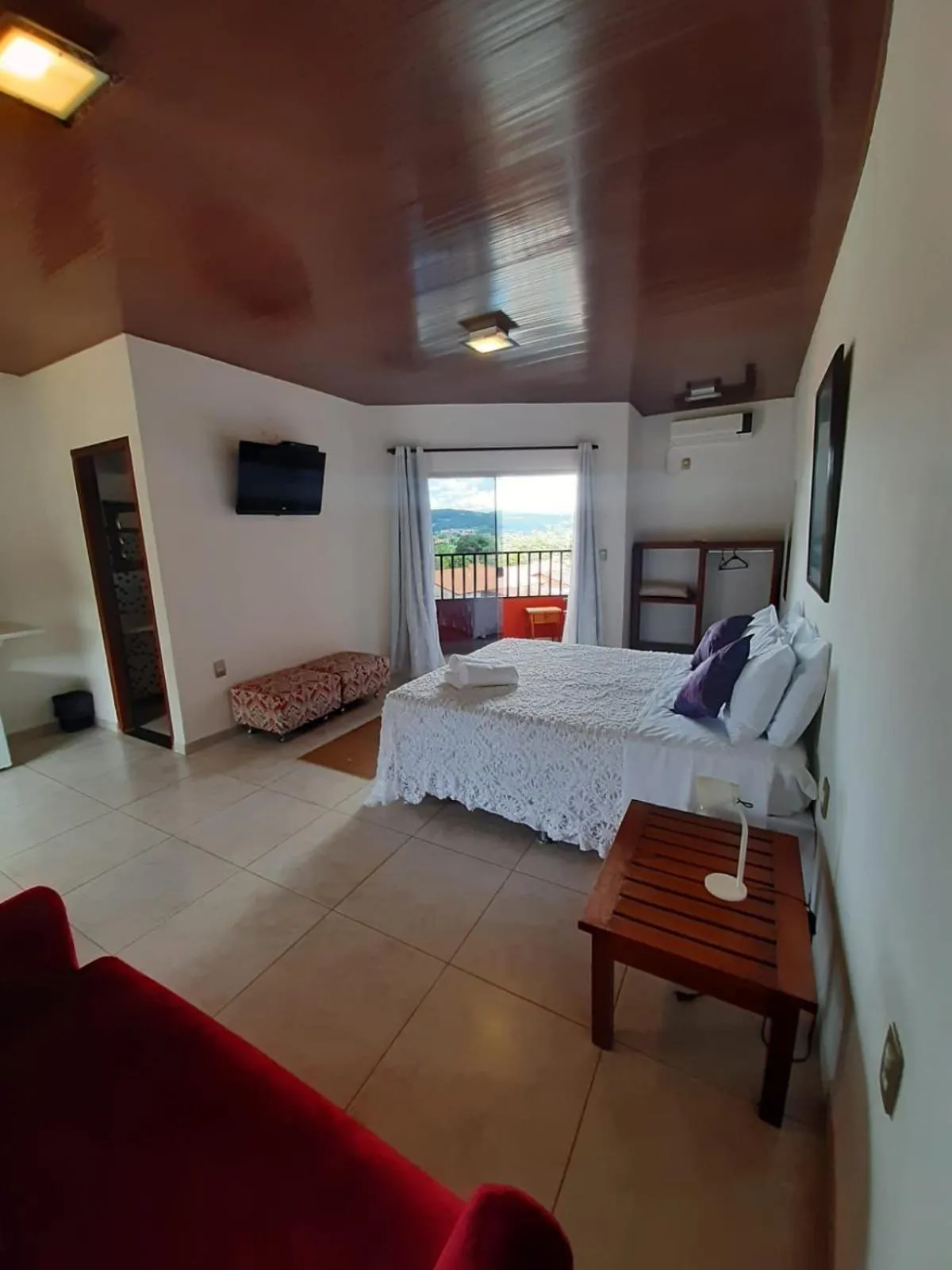 Bed in Pousada Ikabana