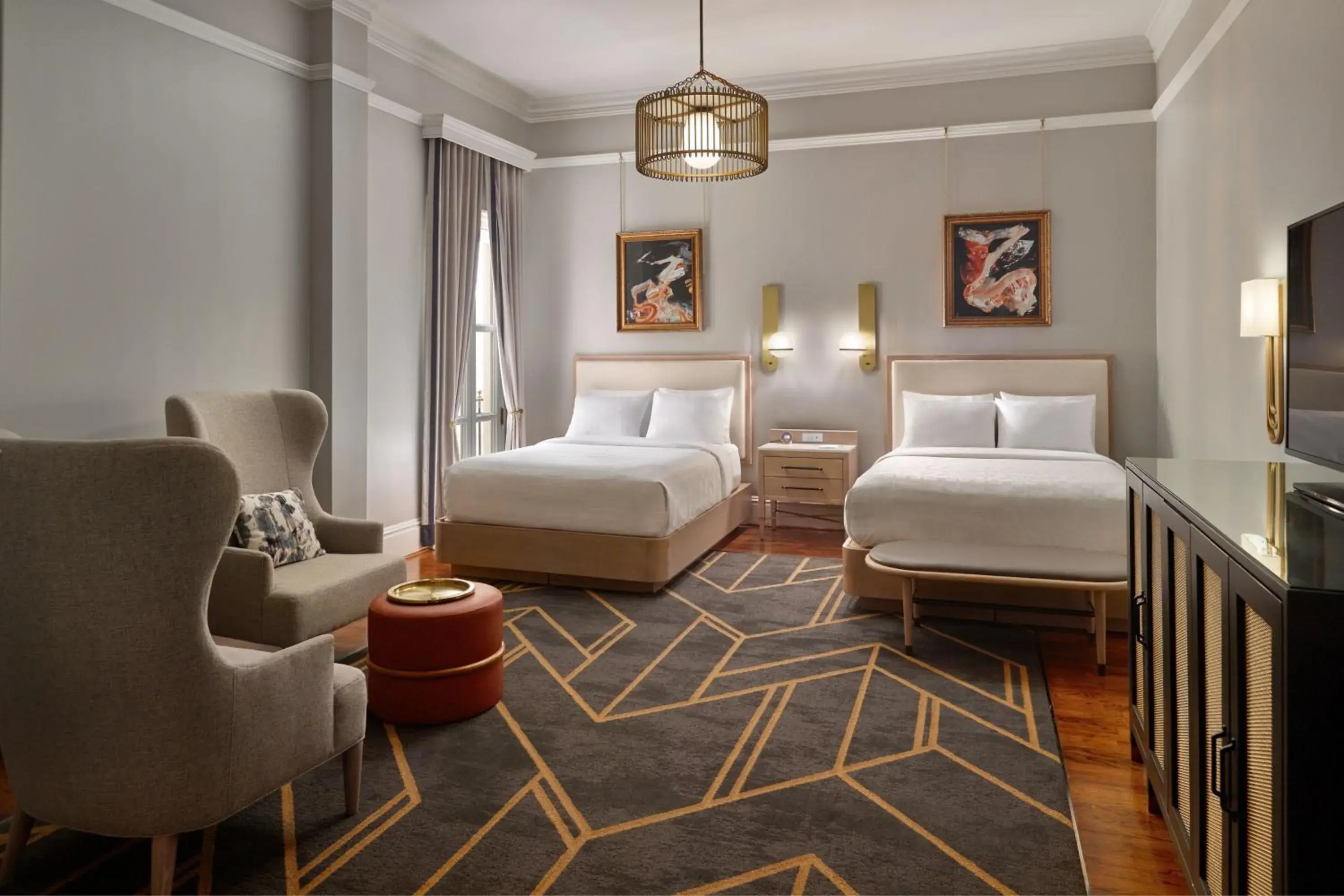 Standard Queen Room with Two Queen Beds and Atrium View in The Tremont House, Galveston, a Tribute Portfolio Hotel Standard Queen Room with Two Queen Beds and Atrium View in The Tremont House, Galveston, a Tribute Portfolio Hotel