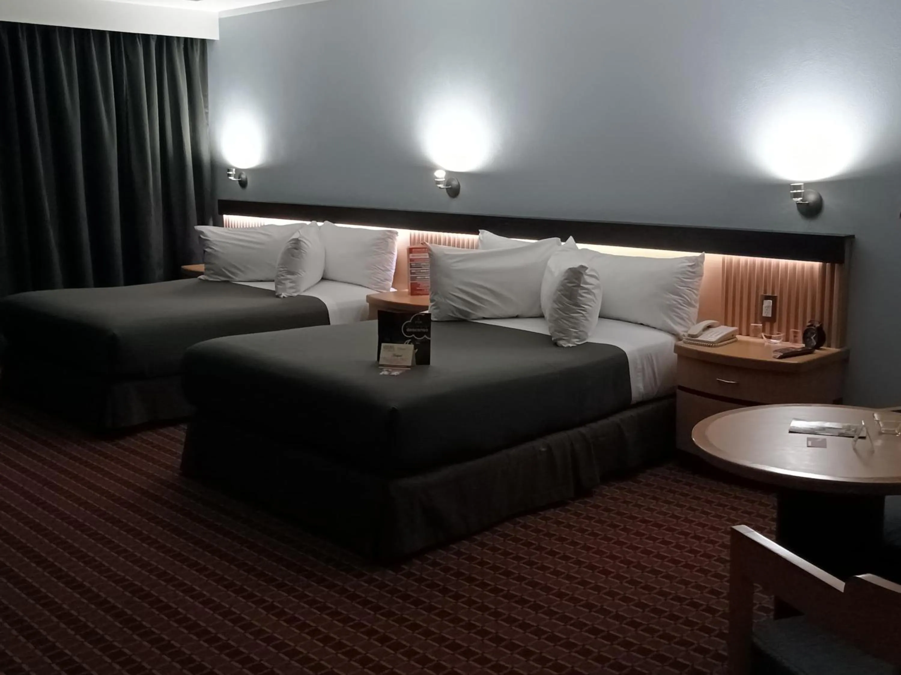 Bedroom in Suites Inn la Muralla Hotel & Spa