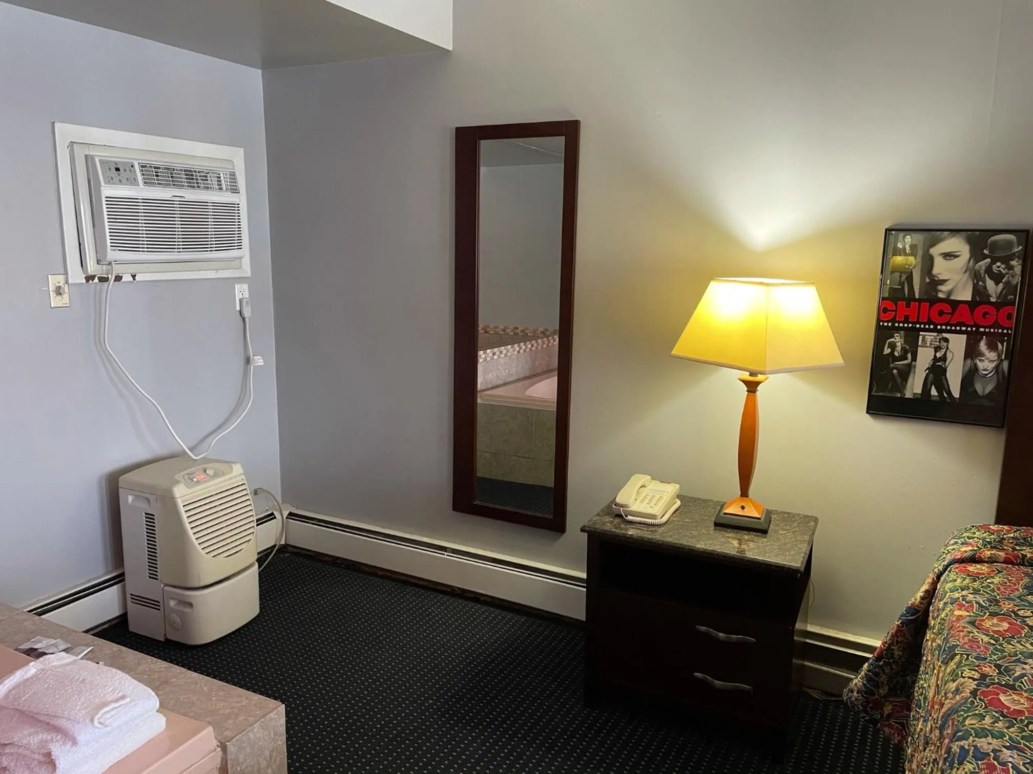 Bed in American Inn and Suites