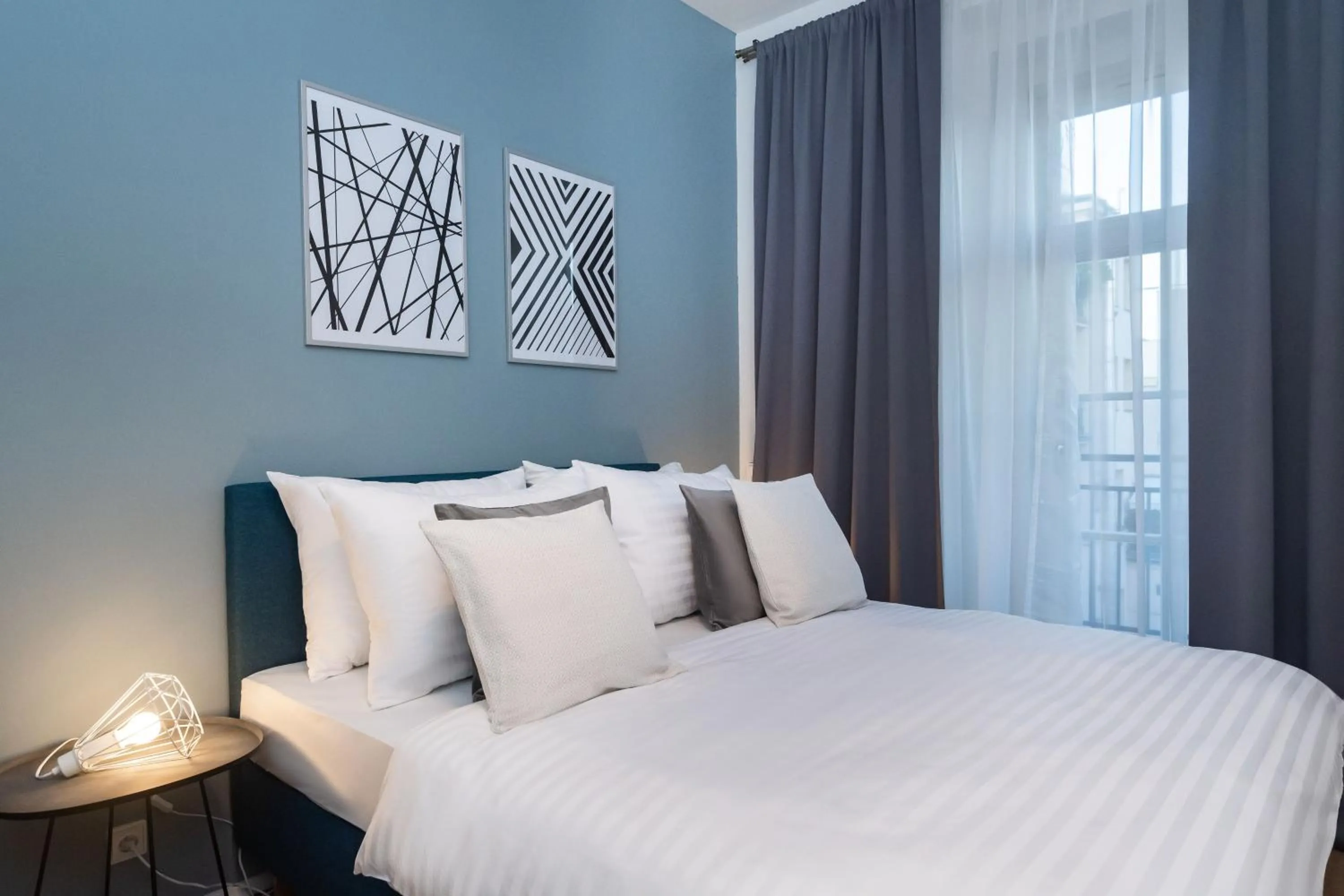 Bed in Seven Wishes Boutique Residence by Dwellfort