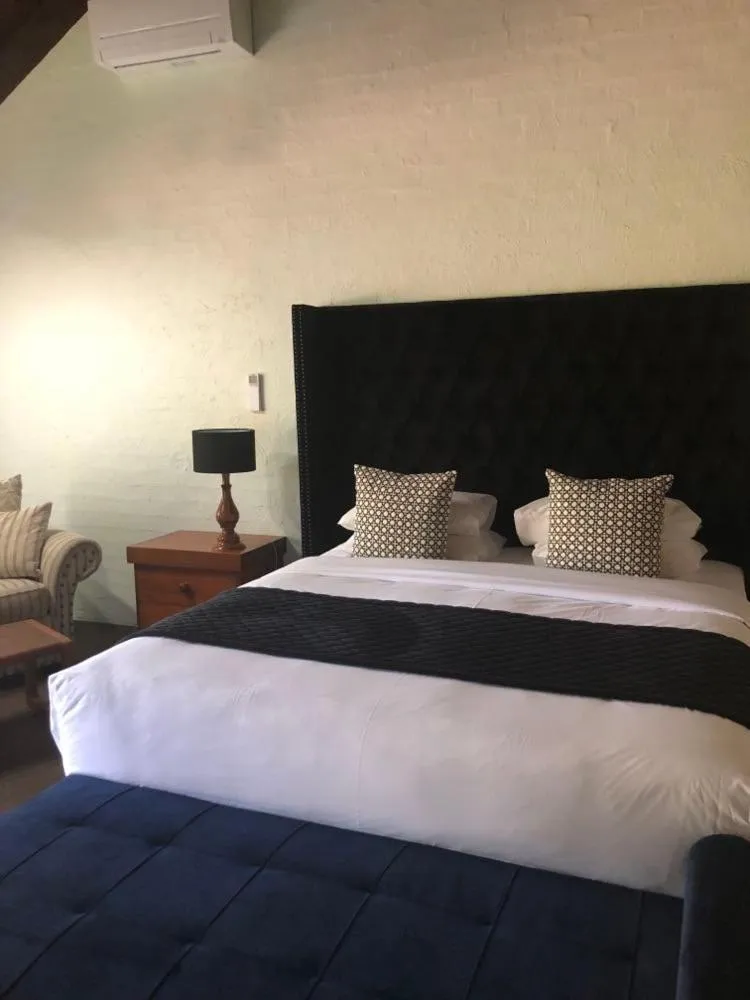 Bed in Olde Horsham Motor Inn