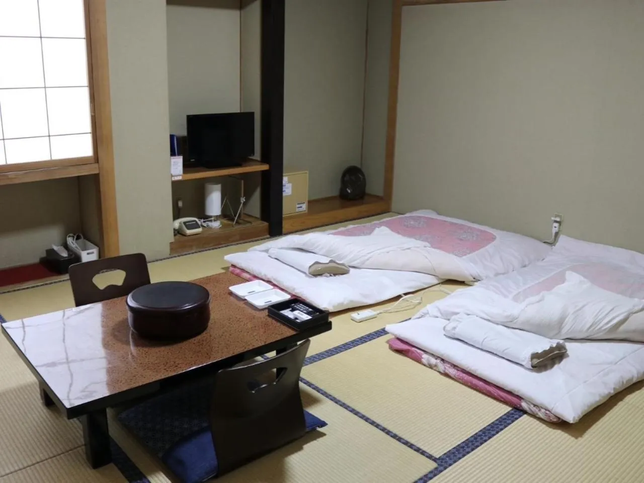 Bed in Hotel Suehiro