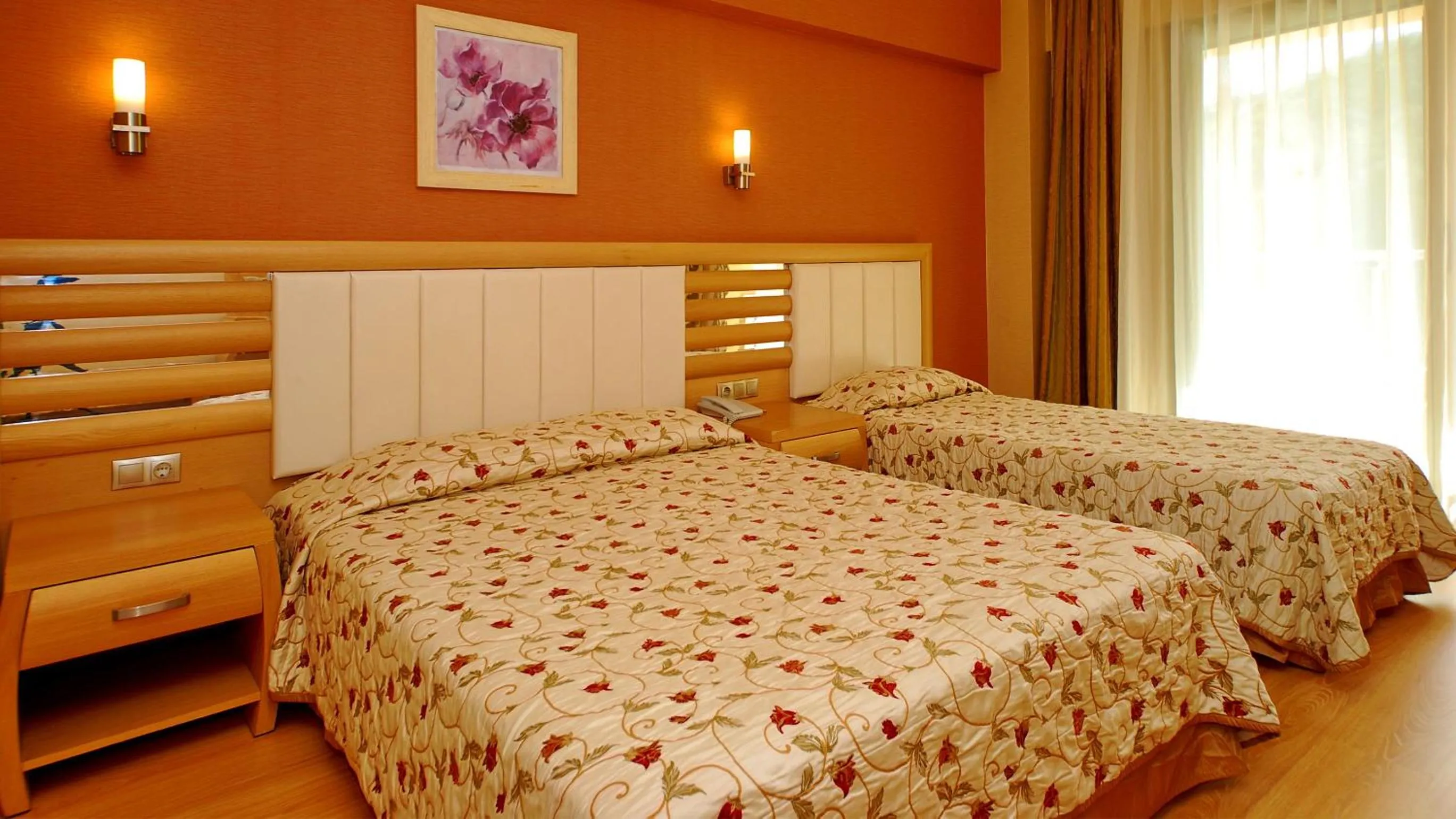 Bed in Grand Pasa Hotel