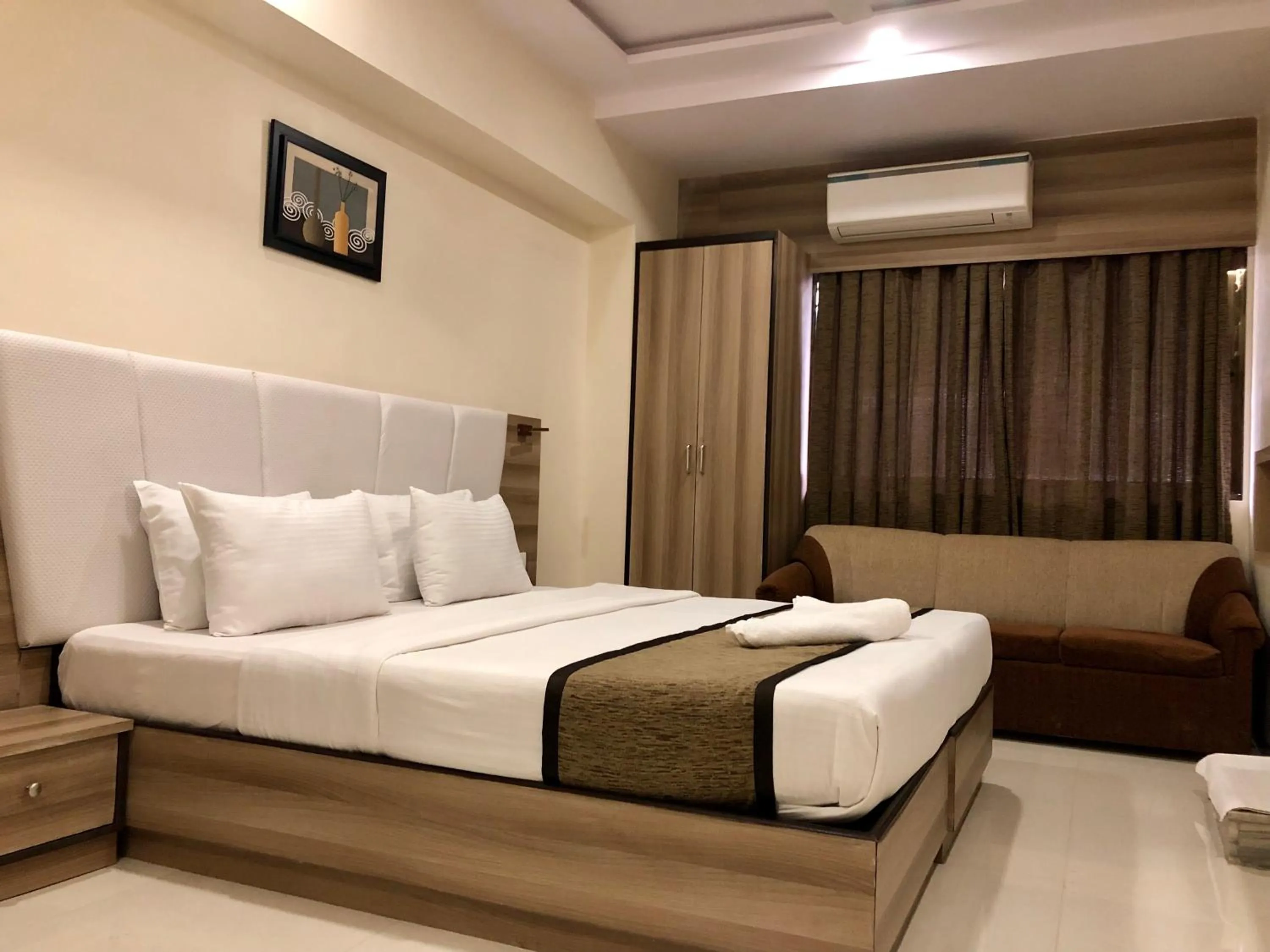 Photo of the whole room, Bed in Hotel Avon Ruby Dadar