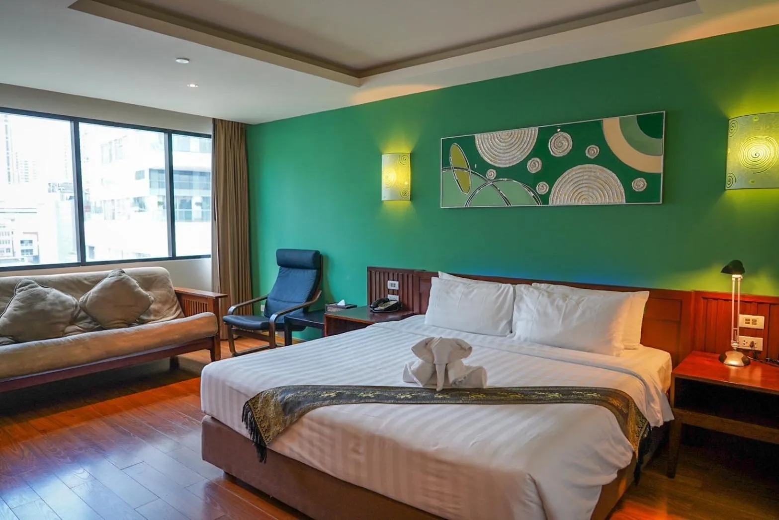 Bed in Hotel Mermaid Bangkok