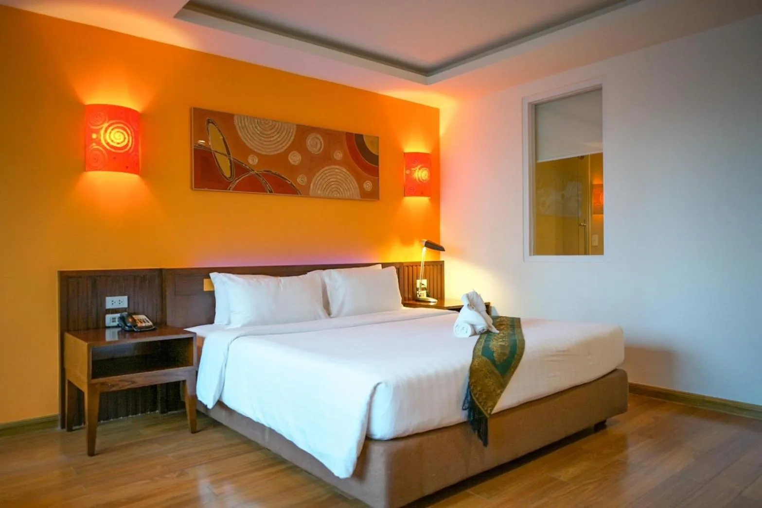 Bed in Hotel Mermaid Bangkok