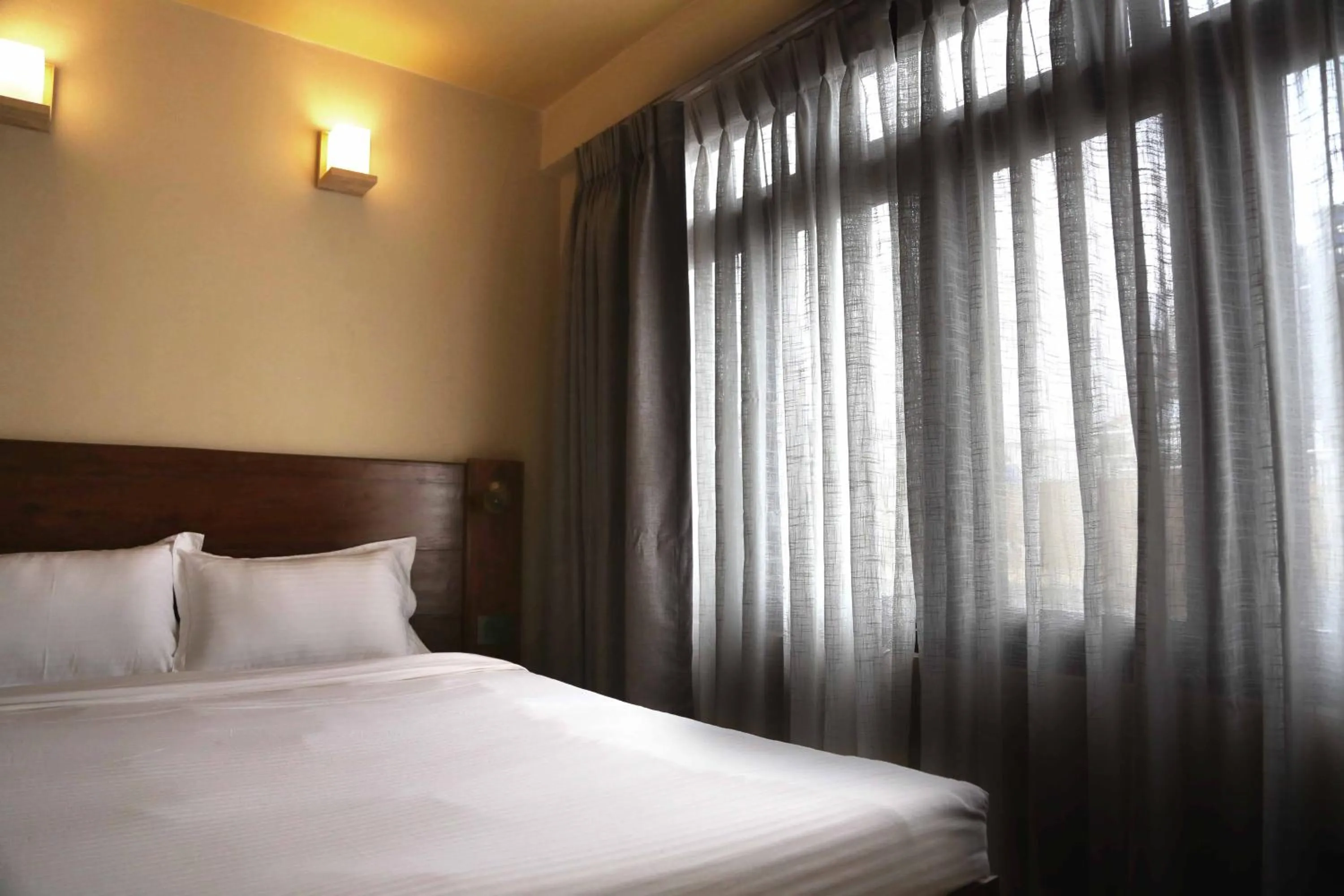 Bed in Sabila Boutique Hotel