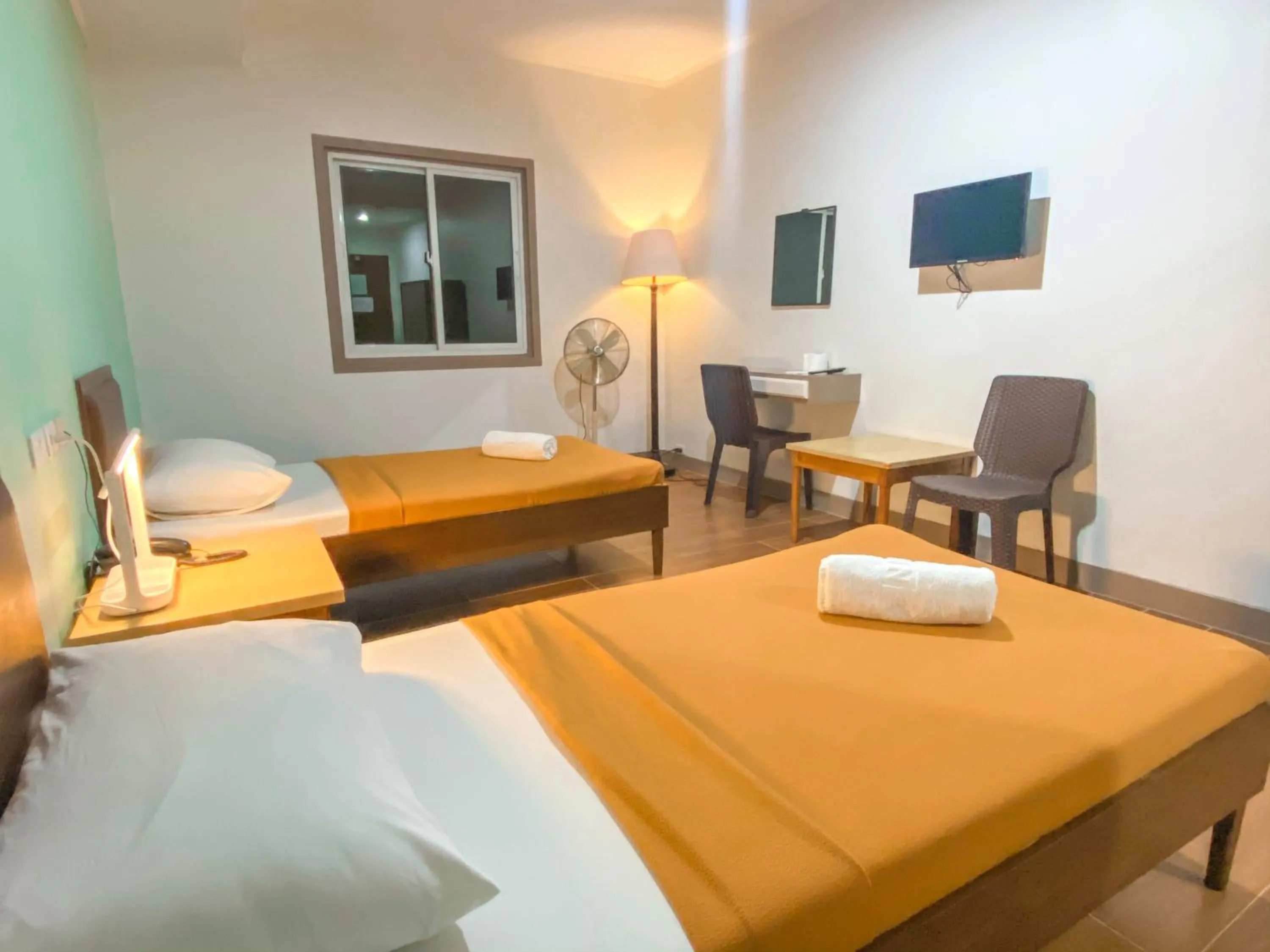 Bedroom in Metro Pines Inn