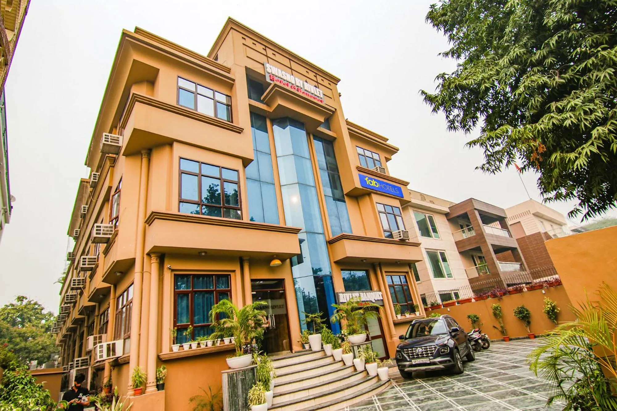 Property building in FabHotel Prime The Rivlet - MG Road & Sikanderpur Metro