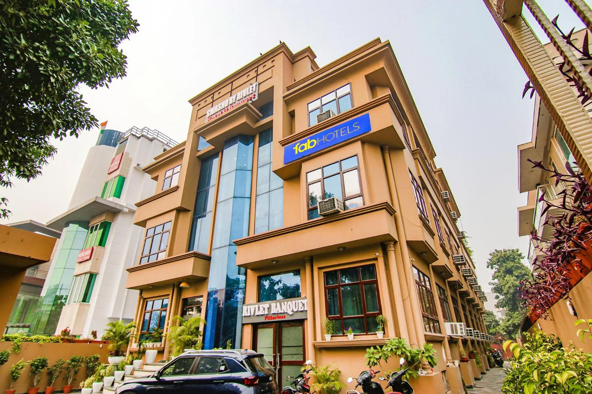 Property building in FabHotel Prime The Rivlet - MG Road & Sikanderpur Metro