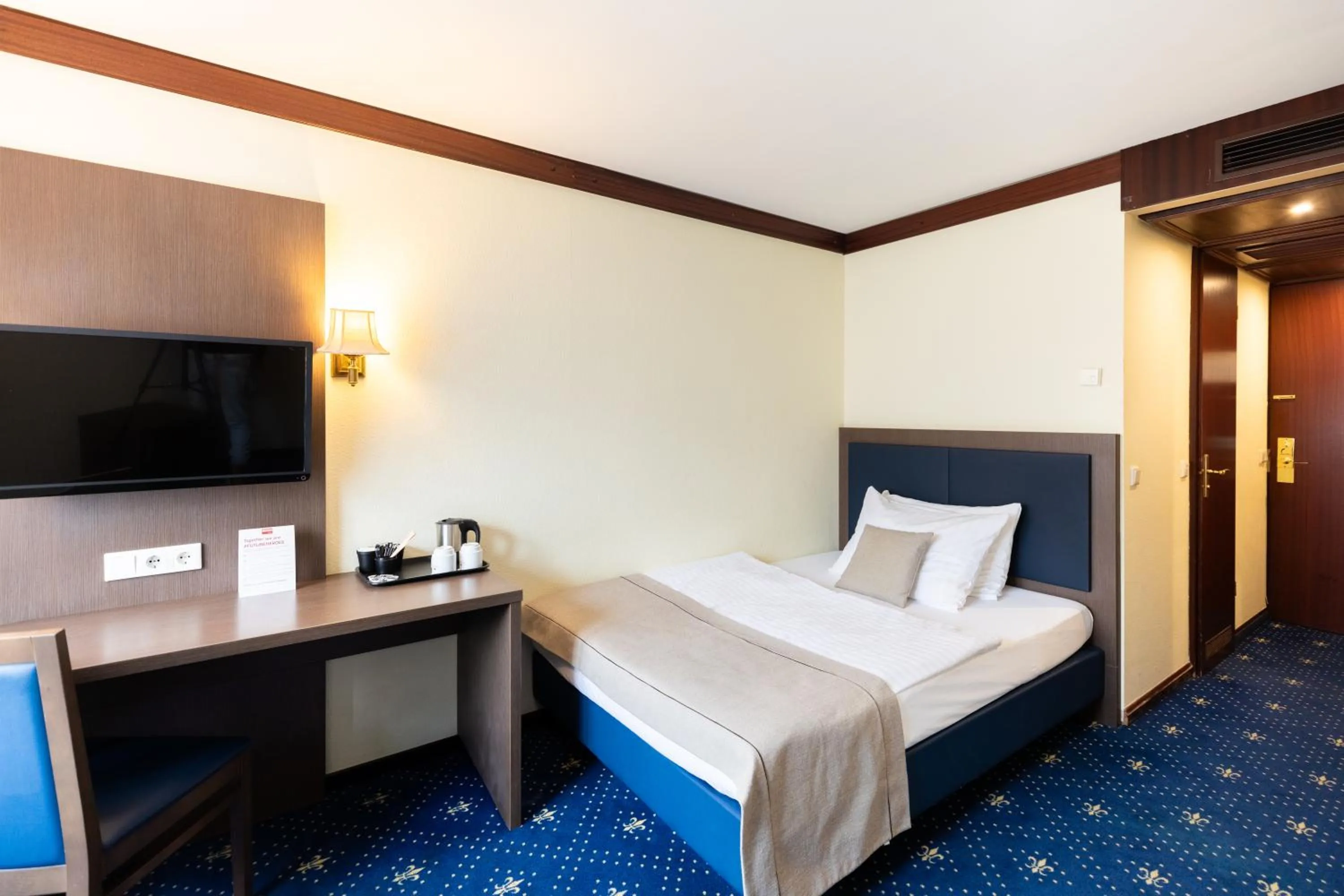 Bed in Novum Hotel Imperial Frankfurt Messe