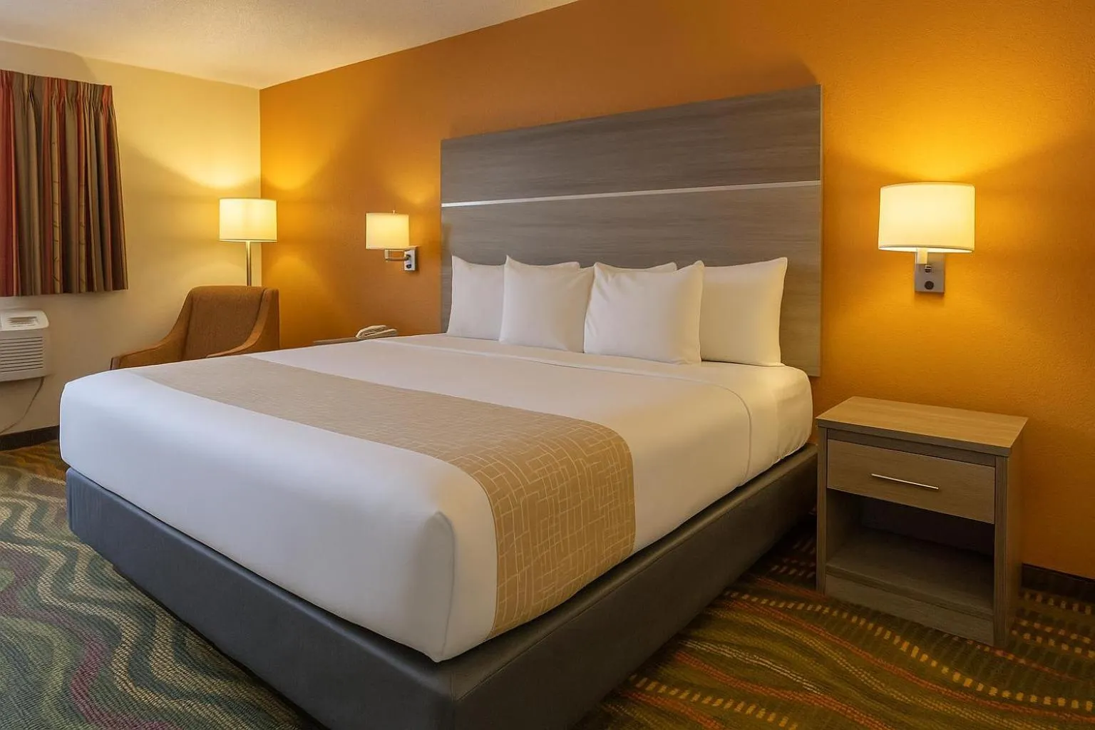 Bed in Travelodge by Wyndham Muskegon