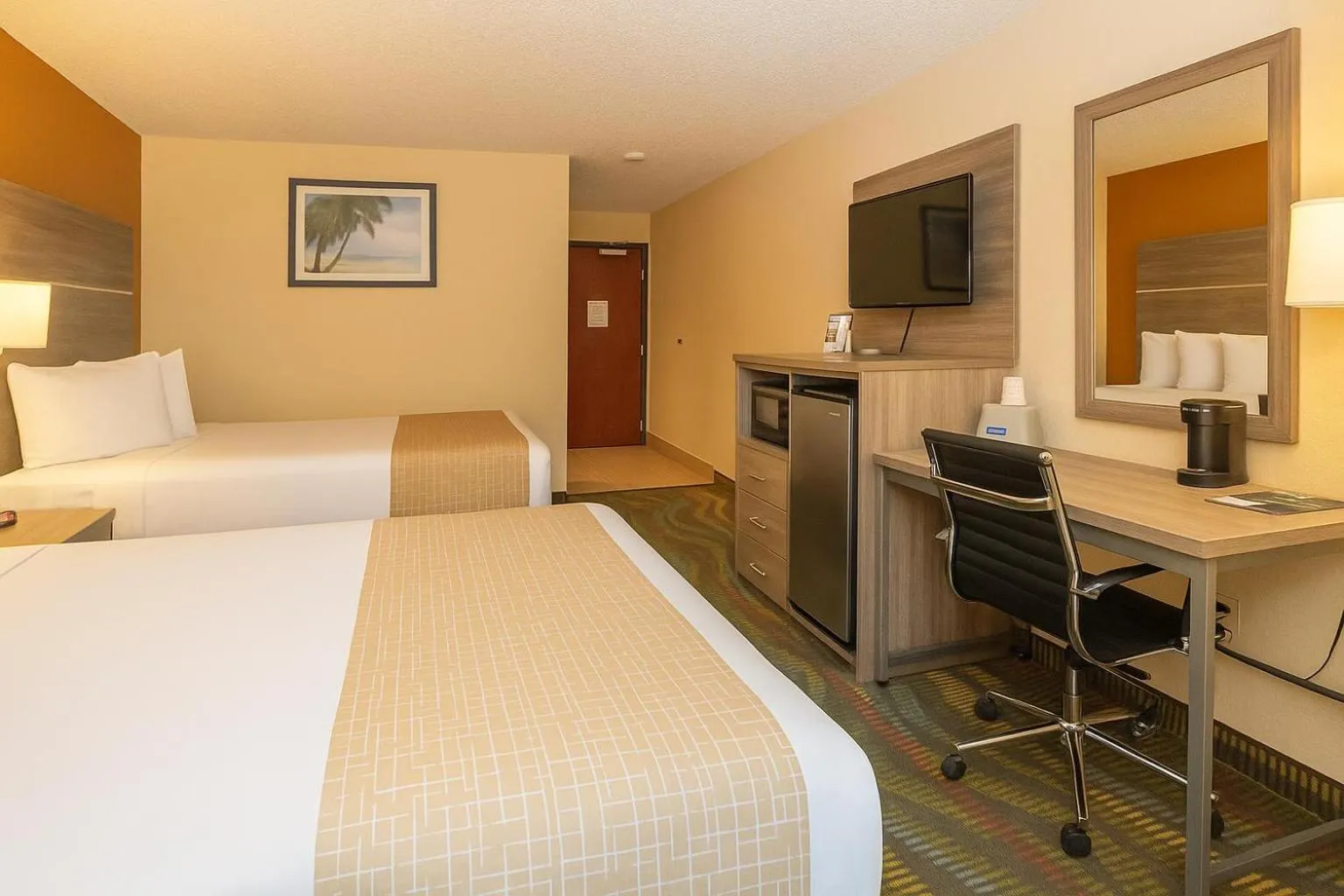 Bed in Travelodge by Wyndham Muskegon