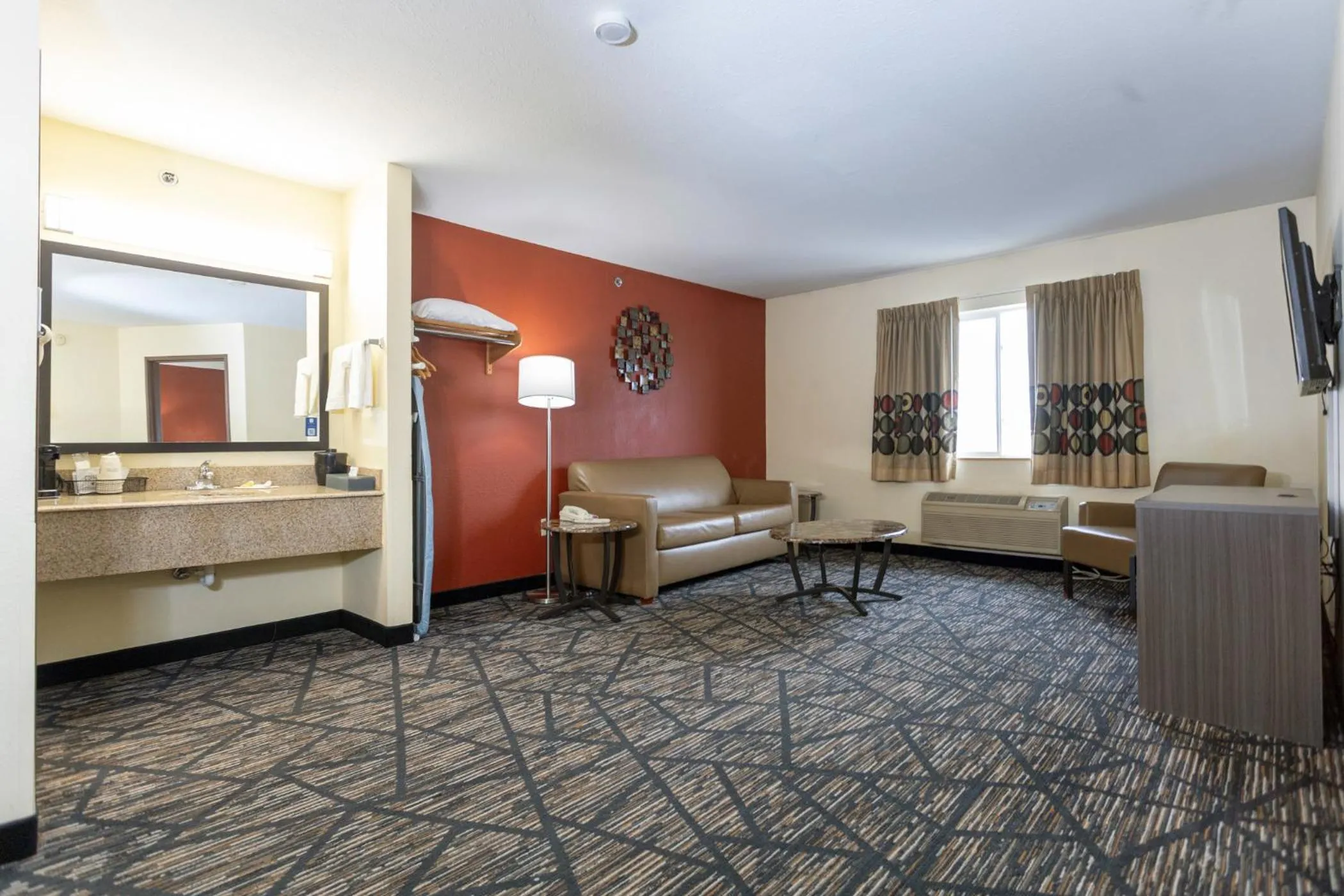 Seating area in Super 8 by Wyndham Big Rapids