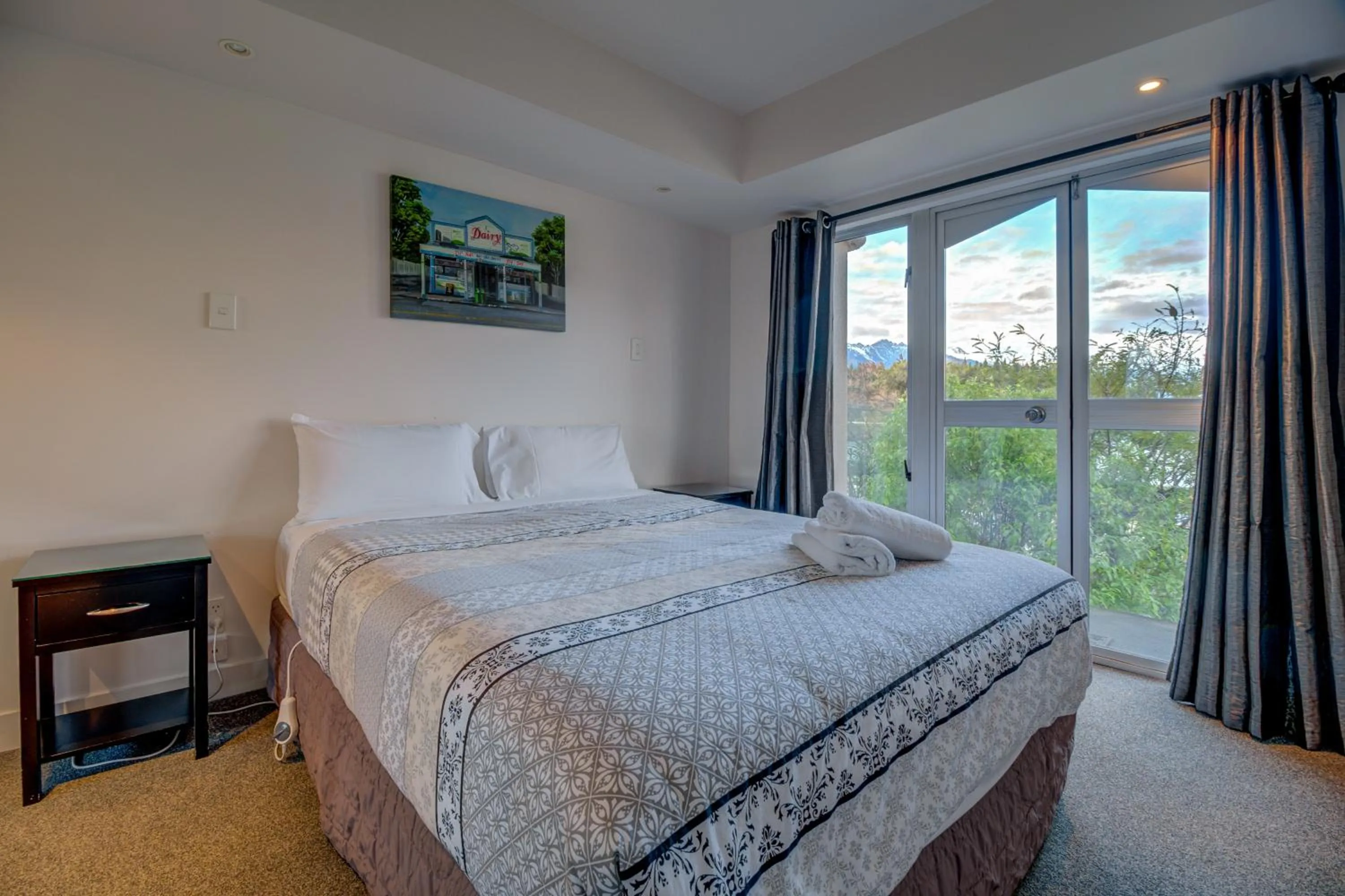 Photo of the whole room, Bed in Lakefront Apartments,18 LAKE ESPLANADE ROAD