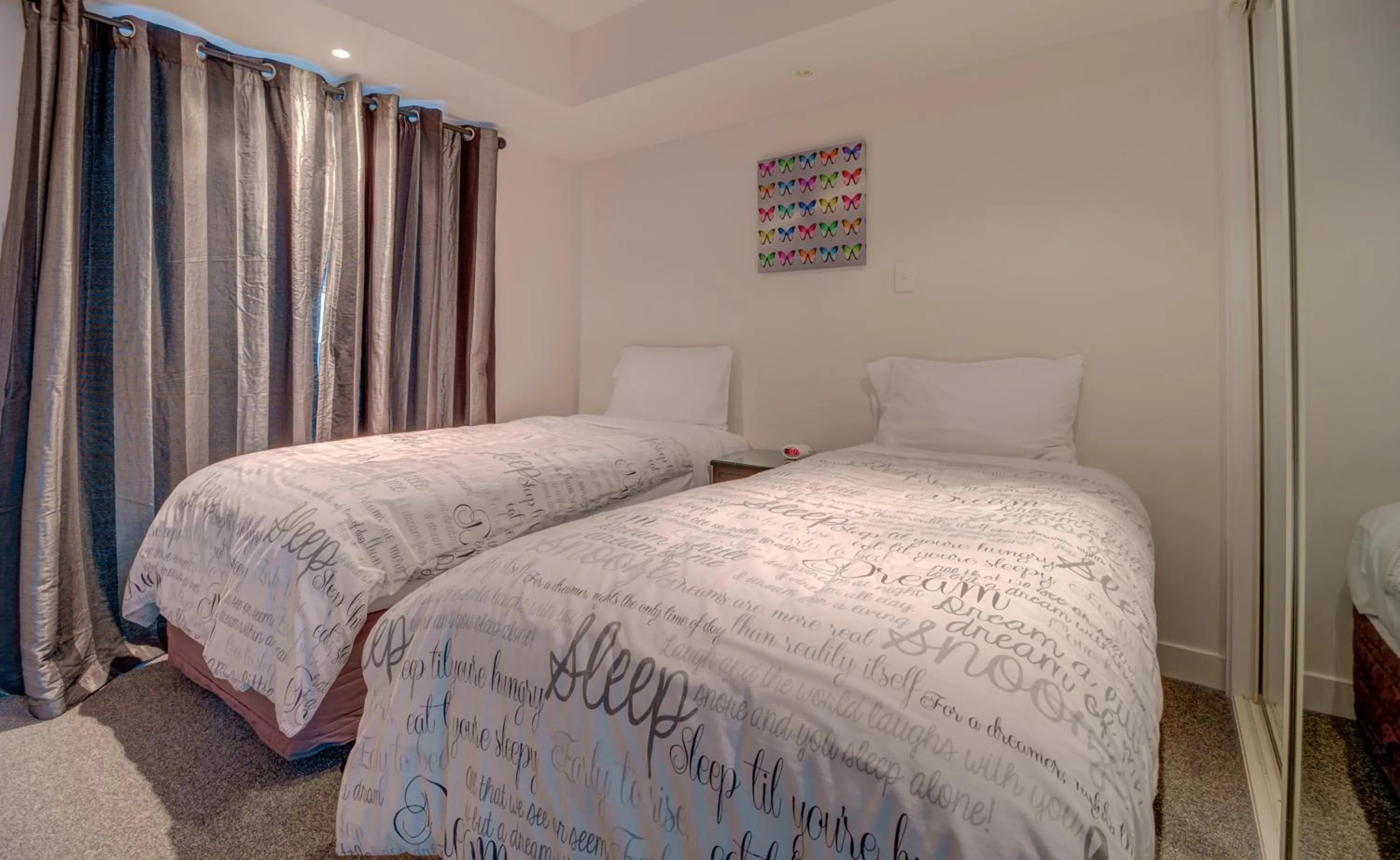 Photo of the whole room, Bed in Lakefront Apartments,18 LAKE ESPLANADE ROAD