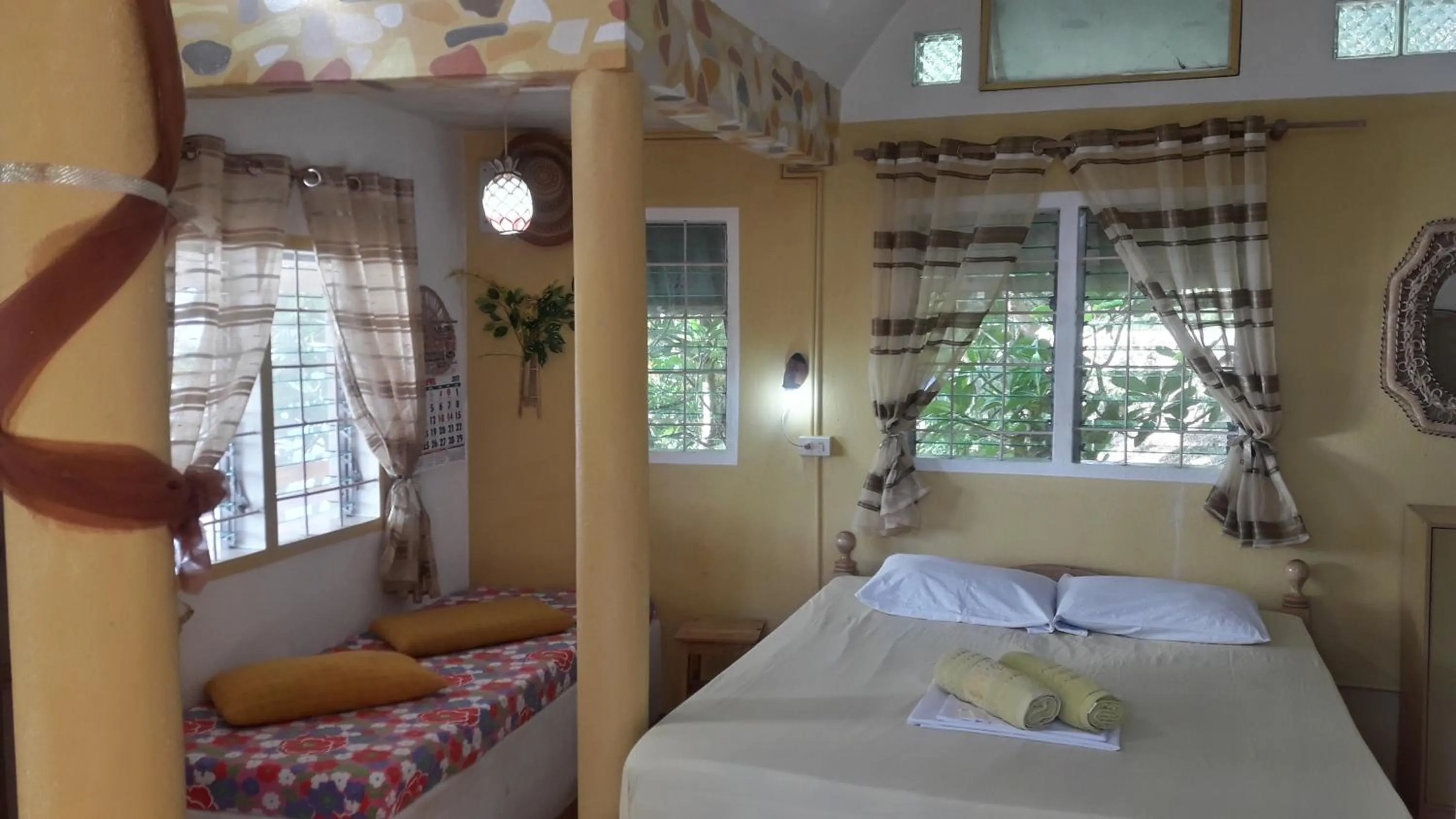 Bed in Casa de la Playa Beach Resort