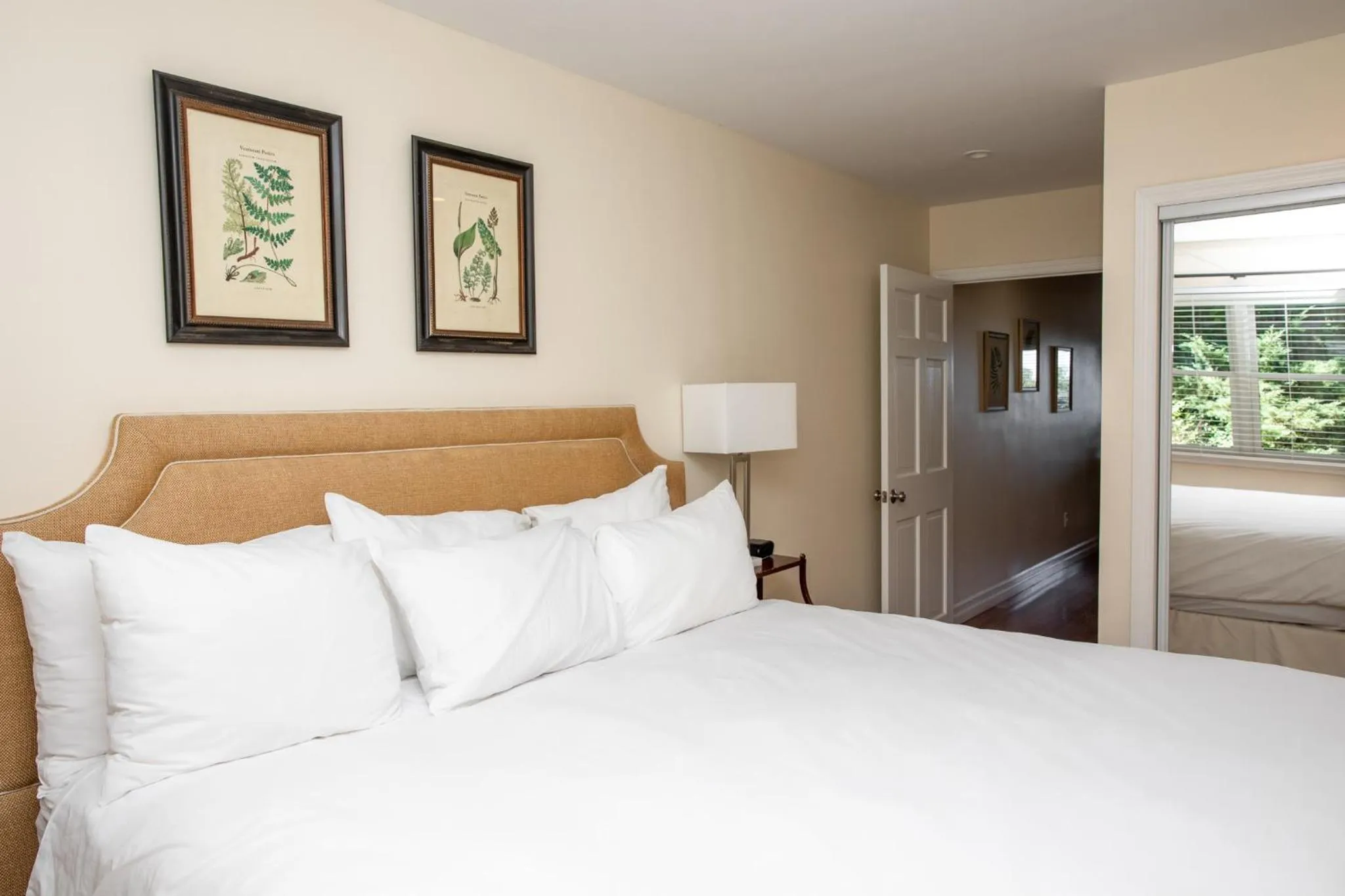 Bed in Three Village Inn