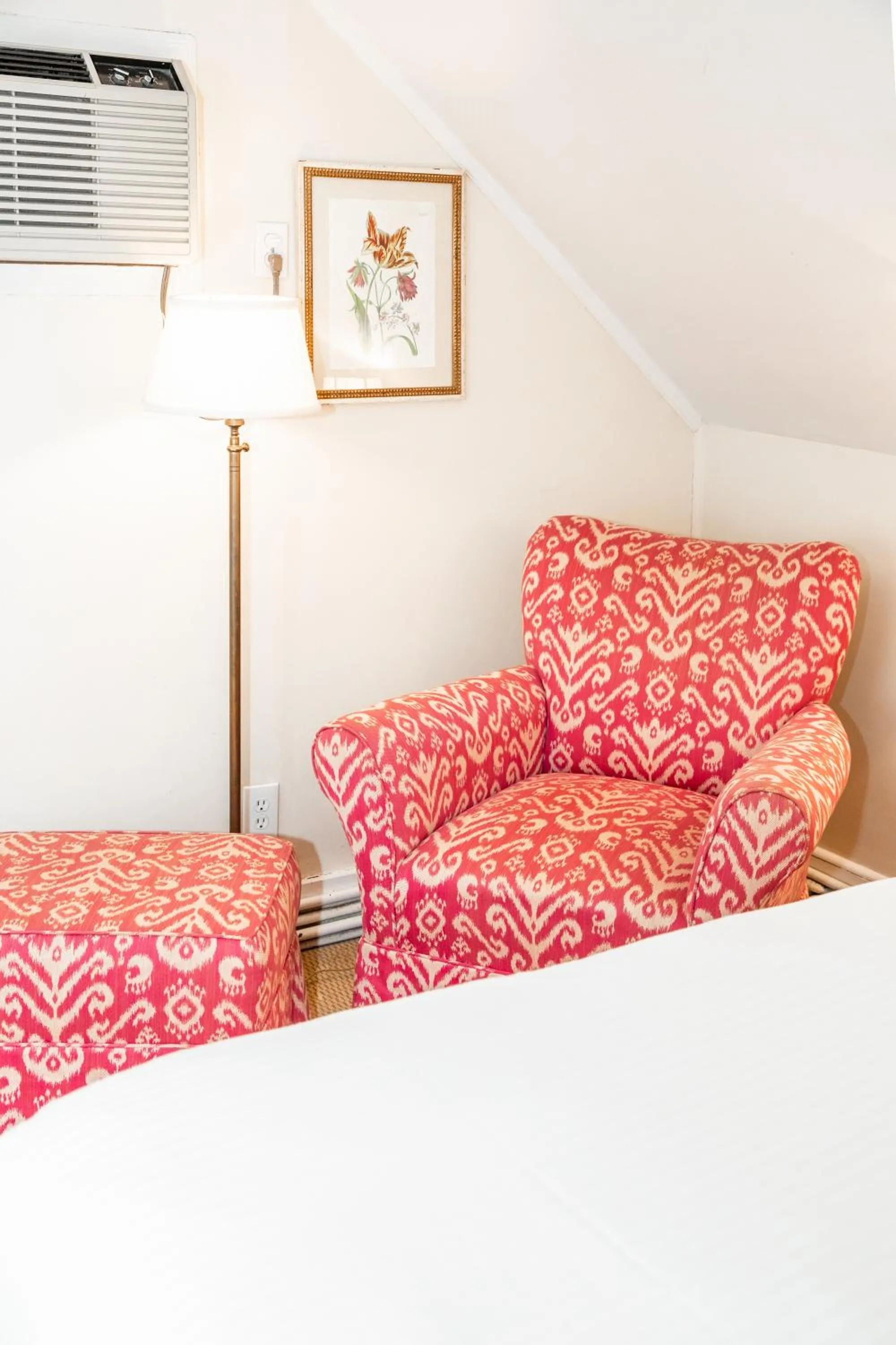 Bed in Three Village Inn