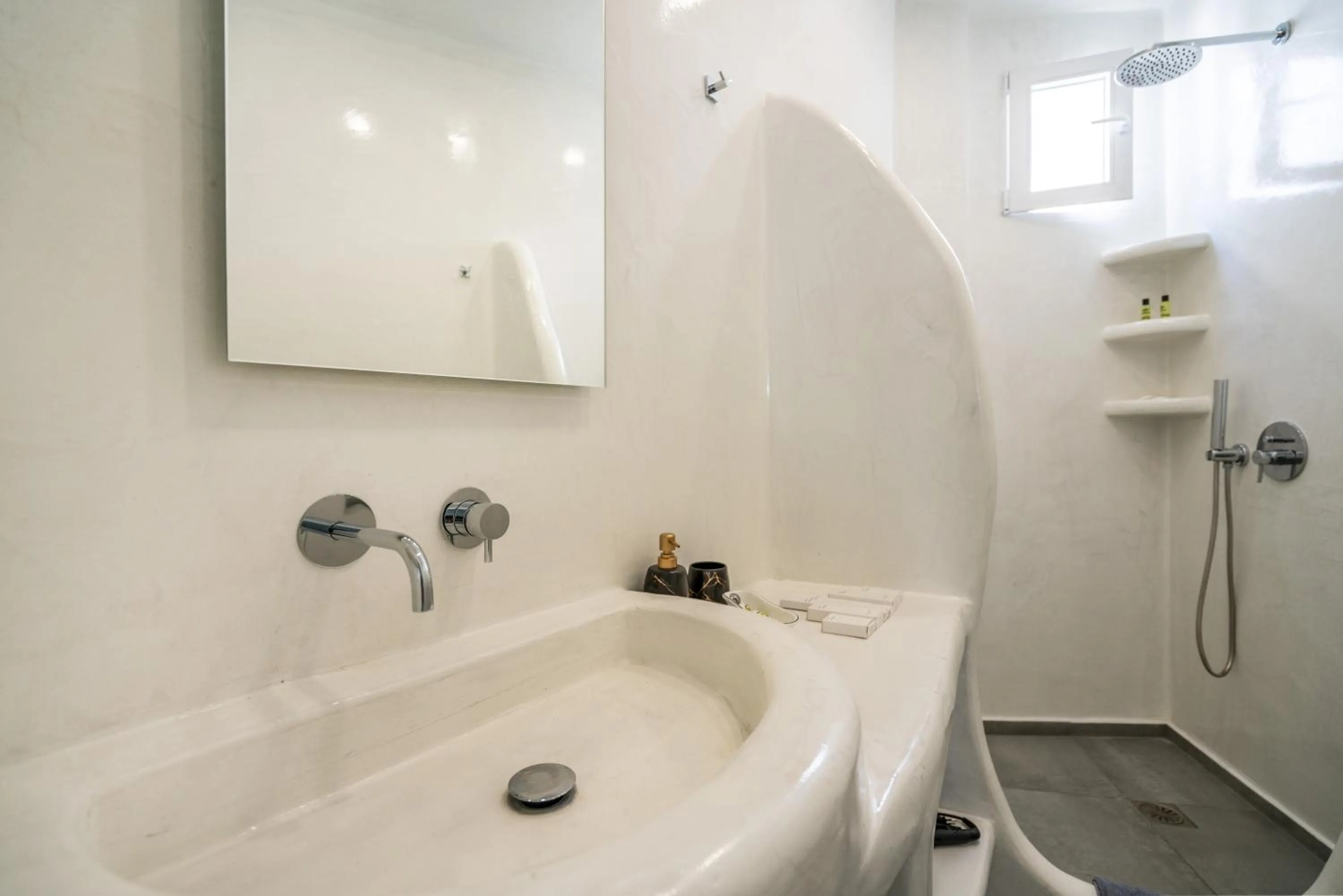 Bathroom in The Muses of Santorini Private Jacuzzi Suites