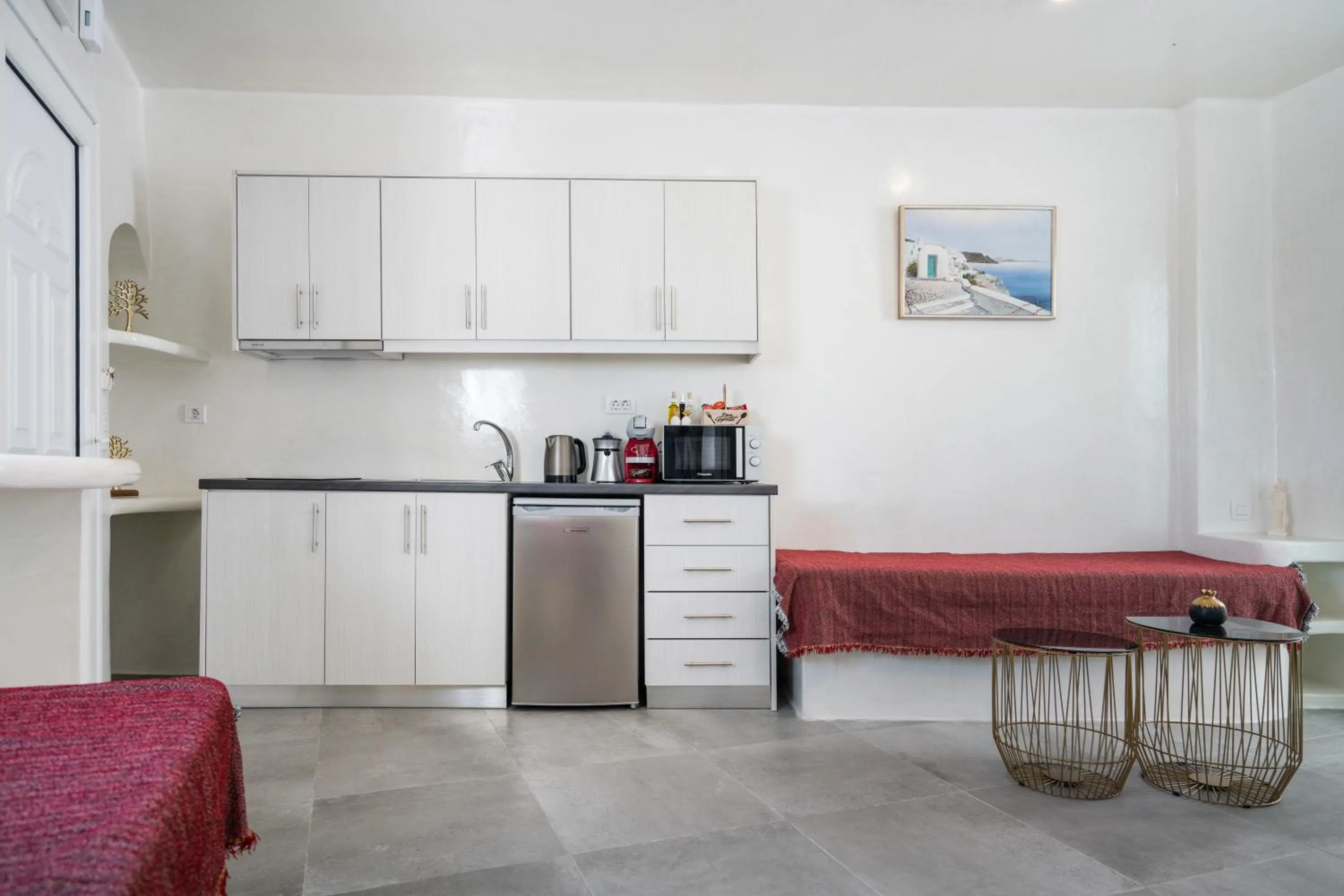 Kitchen or kitchenette in The Muses of Santorini Private Jacuzzi Suites