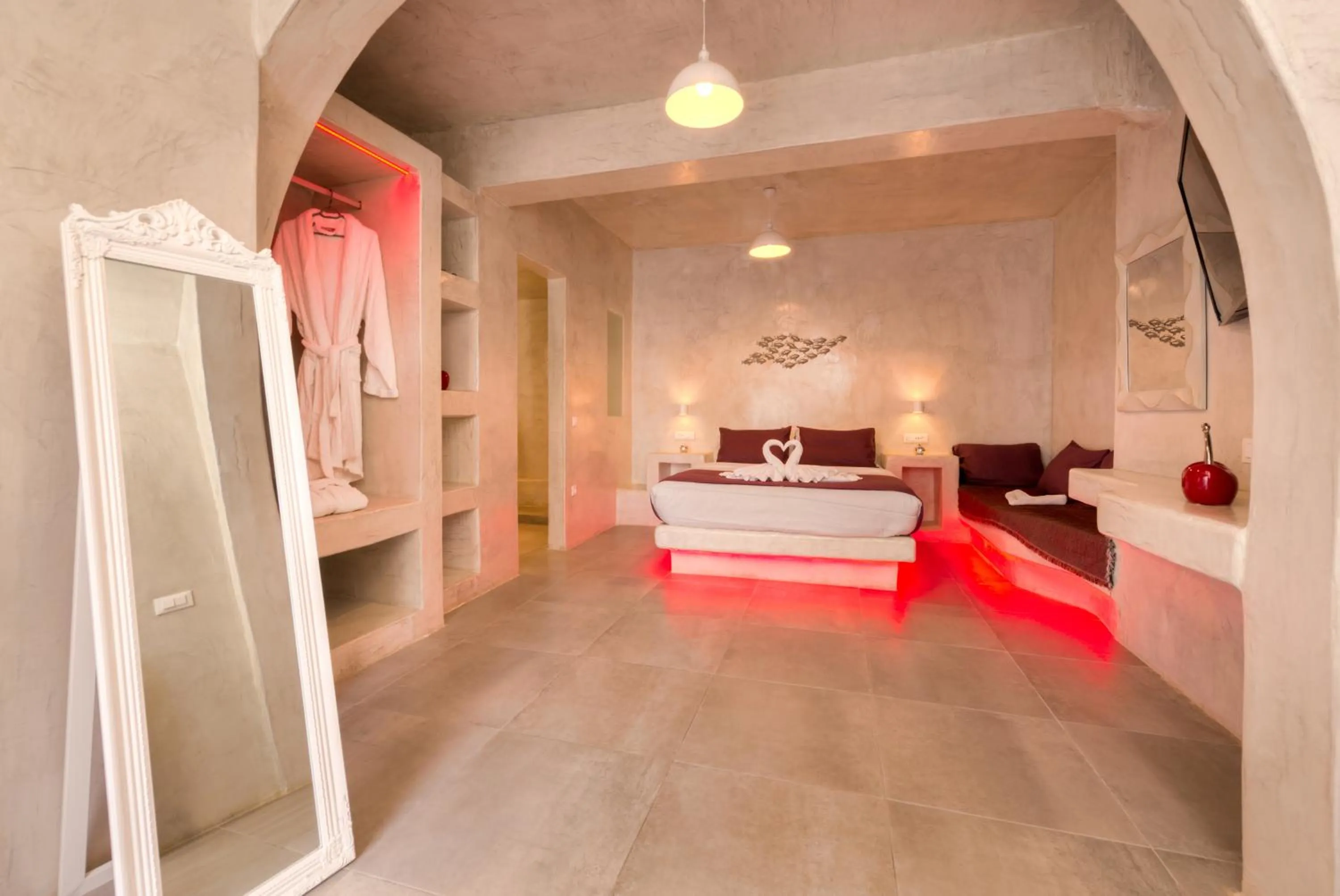 Photo of the whole room, Bed in The Muses of Santorini Private Jacuzzi Suites