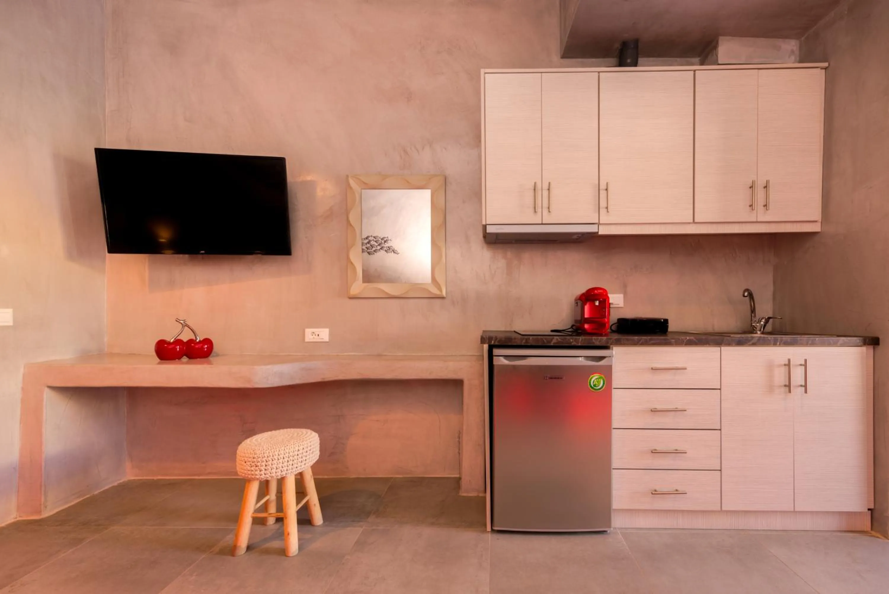 Kitchen or kitchenette in The Muses of Santorini Private Jacuzzi Suites