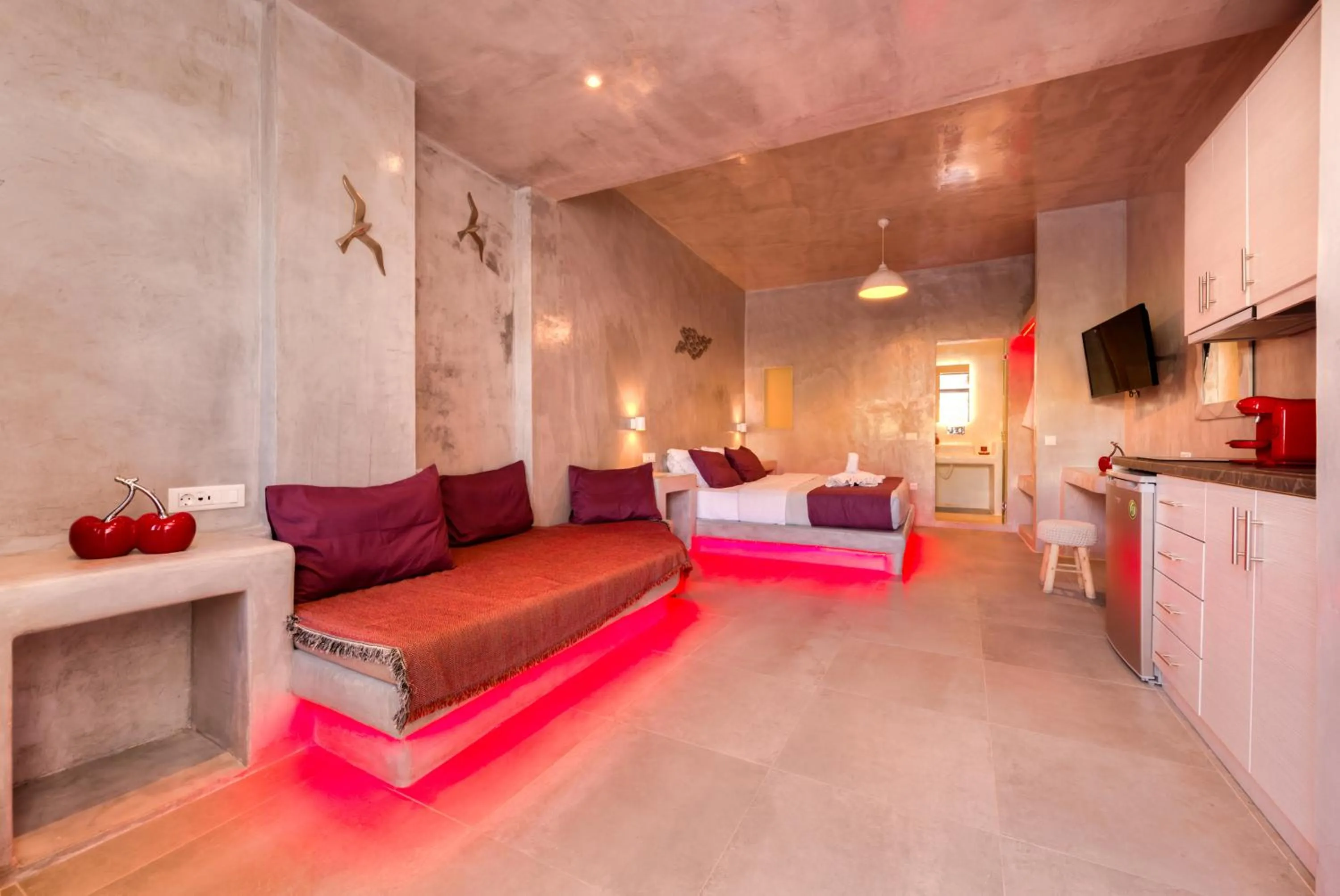 Seating area in The Muses of Santorini Private Jacuzzi Suites