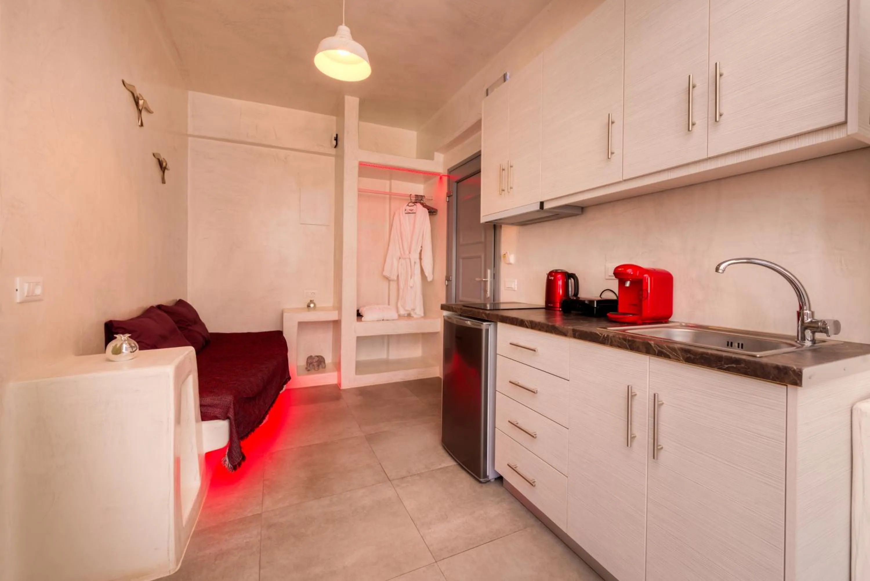 Kitchen or kitchenette in The Muses of Santorini Private Jacuzzi Suites