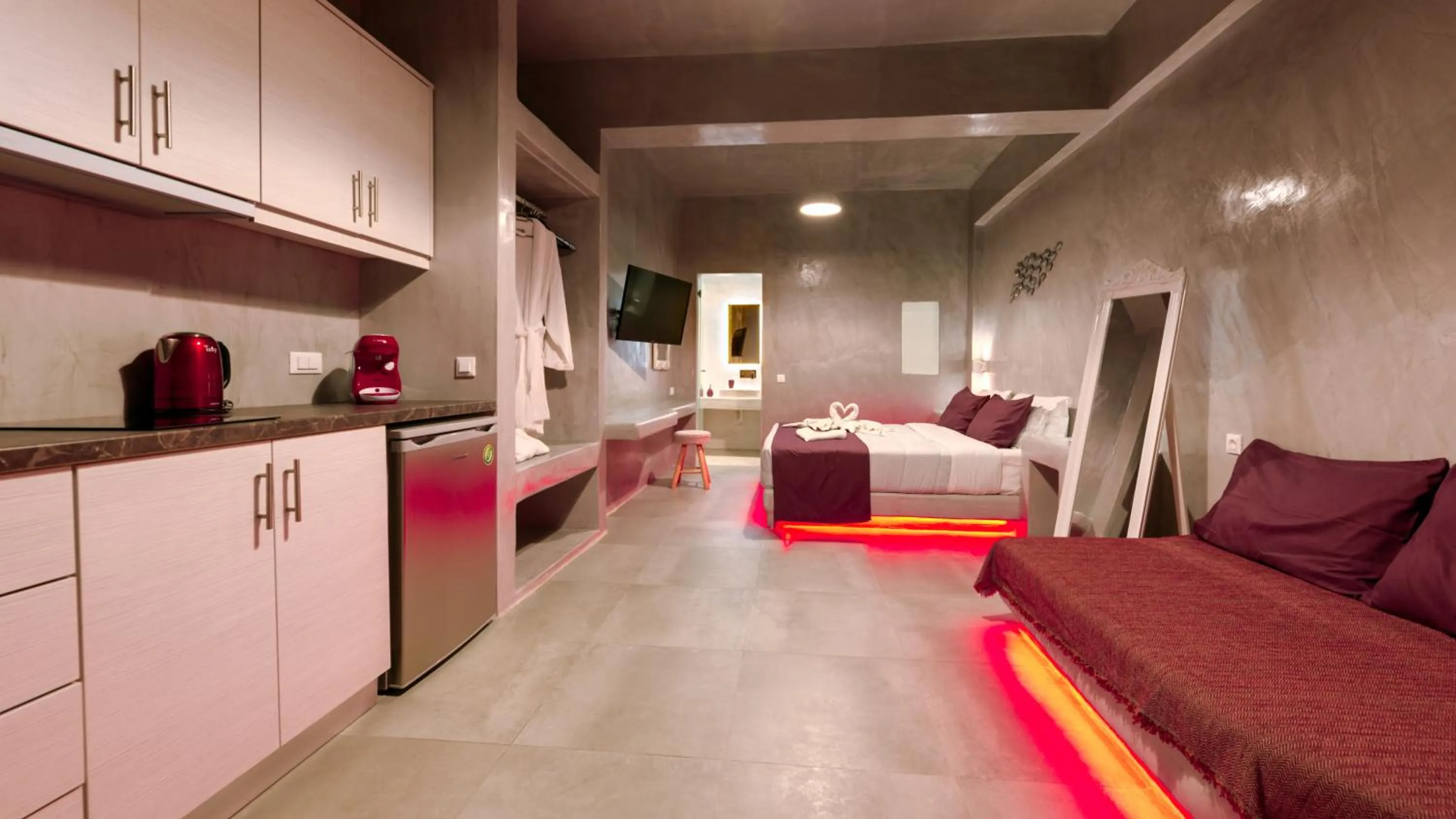 Photo of the whole room, Bed in The Muses of Santorini Private Jacuzzi Suites