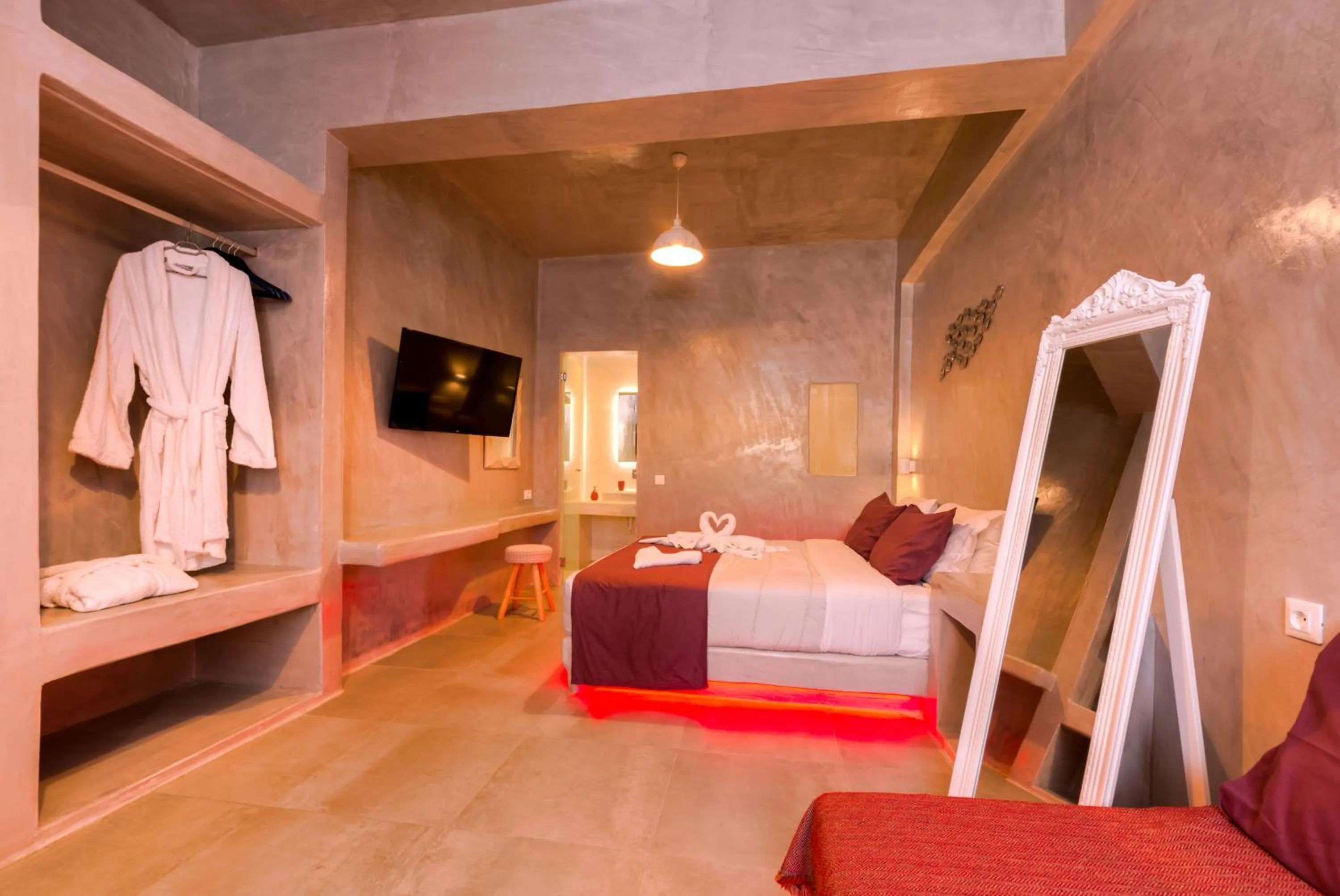 Photo of the whole room, Bed in The Muses of Santorini Private Jacuzzi Suites