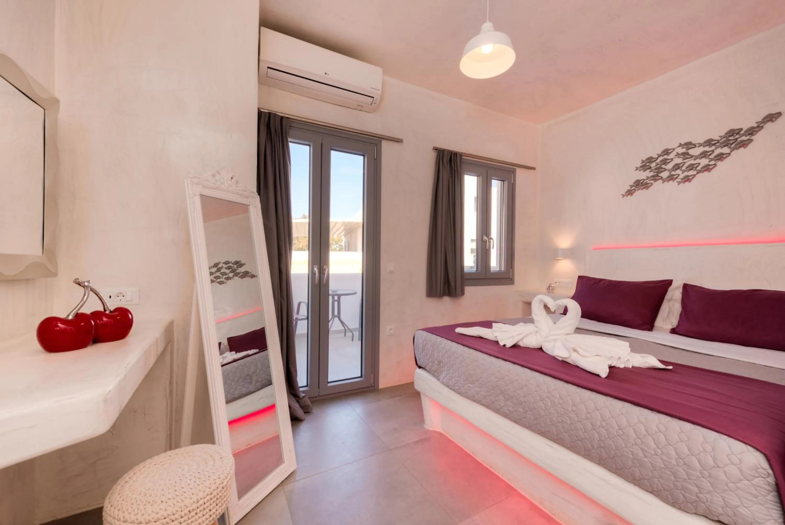 Photo of the whole room, Bed in The Muses of Santorini Private Jacuzzi Suites