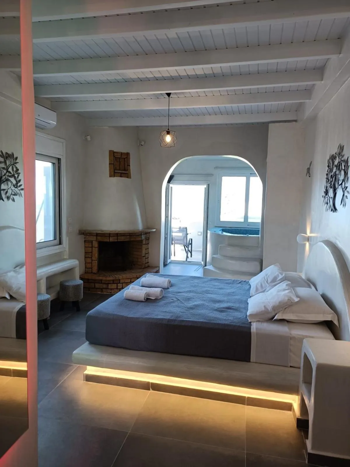 Bedroom, Bed in The Muses of Santorini Private Jacuzzi Suites