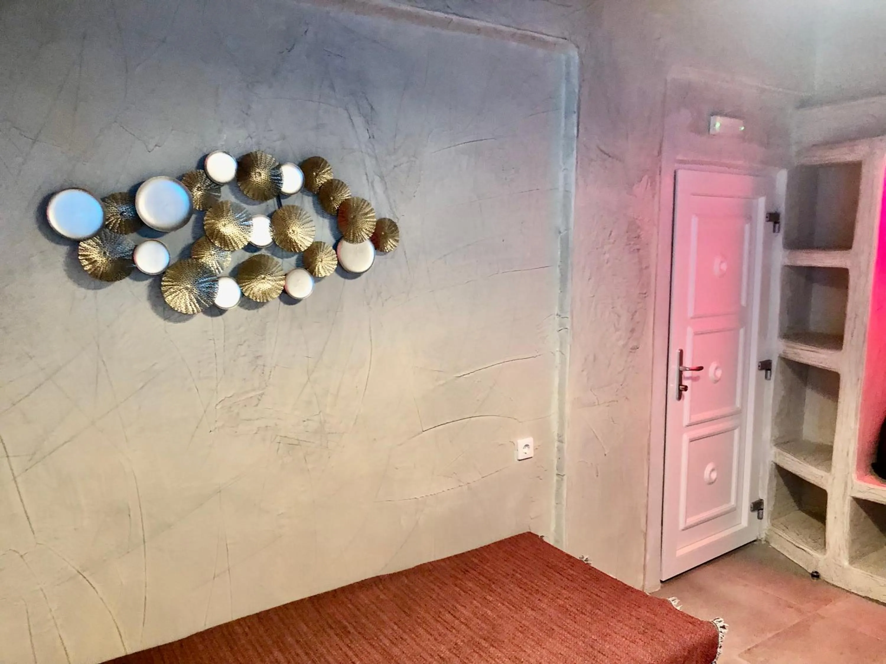 Bed in The Muses of Santorini Private Jacuzzi Suites