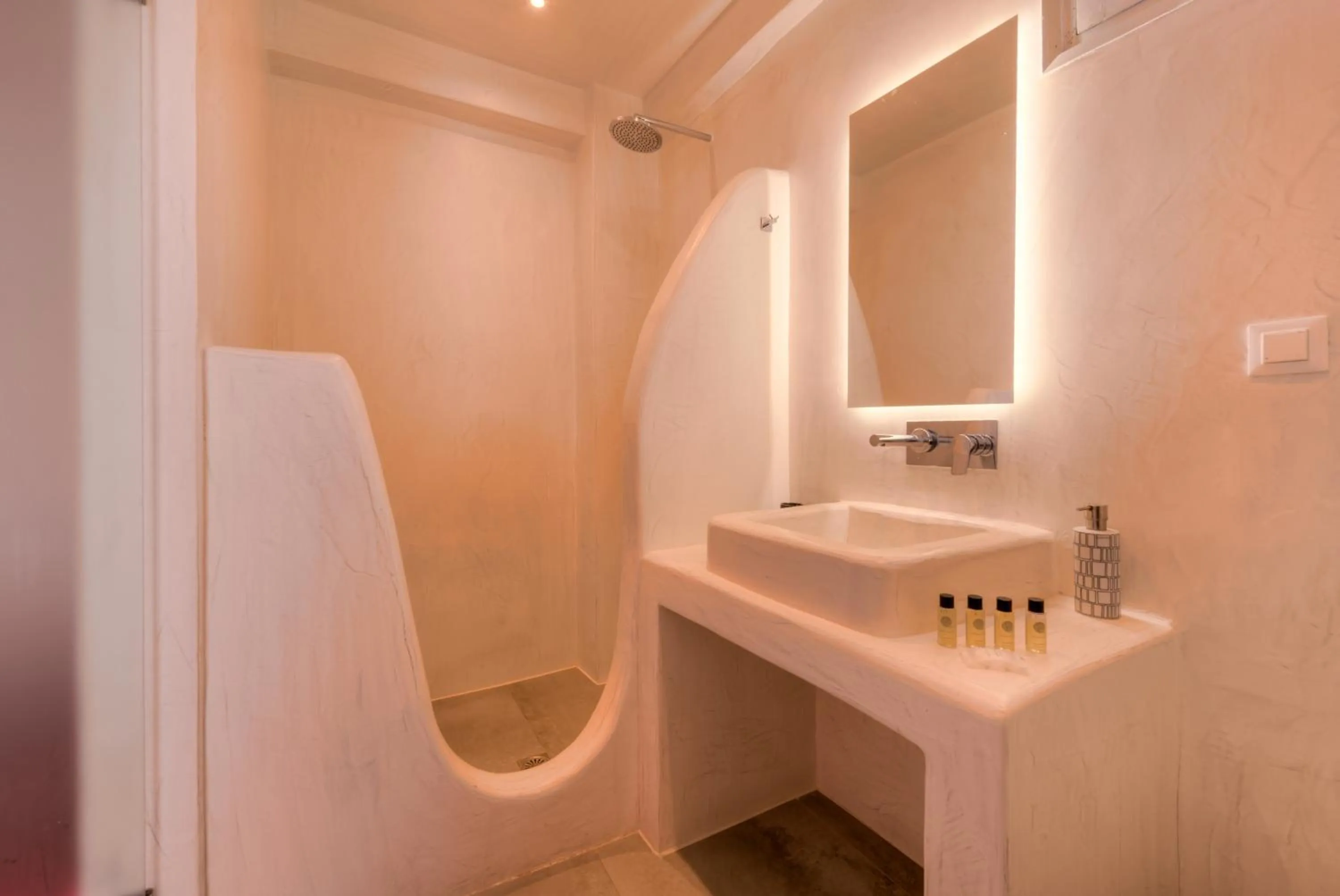 Bathroom in The Muses of Santorini Private Jacuzzi Suites